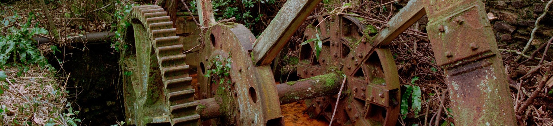 A detail photograph of rusting industrial machinery.