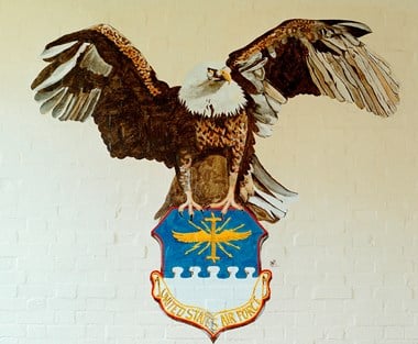 RAF Upper Heyford, Oxfordshire, United States Air Force shield and eagle badge painted by Steve Wellever in 1991.