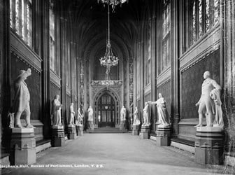Photograph of the interior of St Stephen’s Hall in the Palace of Westminster, lined with statues of historic dignitaries