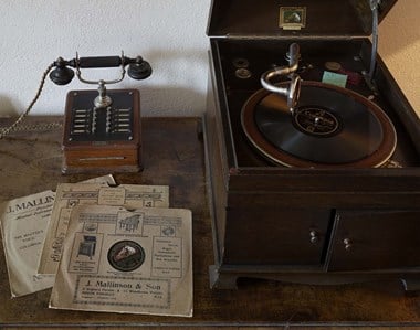 A gramophone and a telephone handset