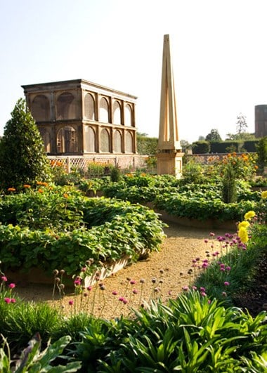 The aviary and one of the obelisks in the re-created garden as it appeared in 2008