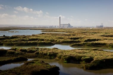 The fragmented remains of Stoke Saltings, with Kingsnorth power station in the background