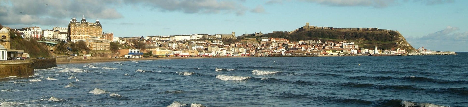 View across the water to the beach and the Grand Hotel, Scarborough, North Yorkshire