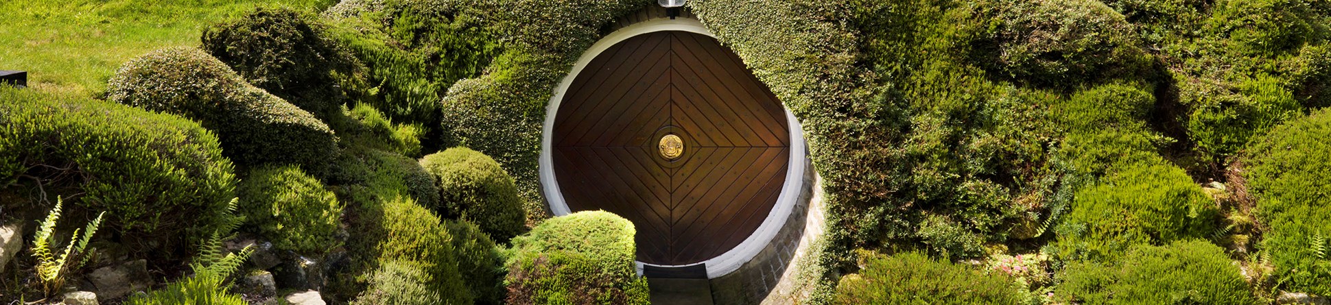 Image of the entrance to Underhill in Holme, West Yorkshire. Designed by Arthur Quarmby, Underhill is Britain’s first modern earth-sheltered house and has been described as a luxury hobbit’s home because of its captivating design.