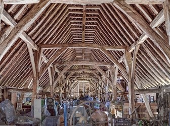 View of interior structure with Arch brace, Crown Posts, Tie Beams. View from east.
