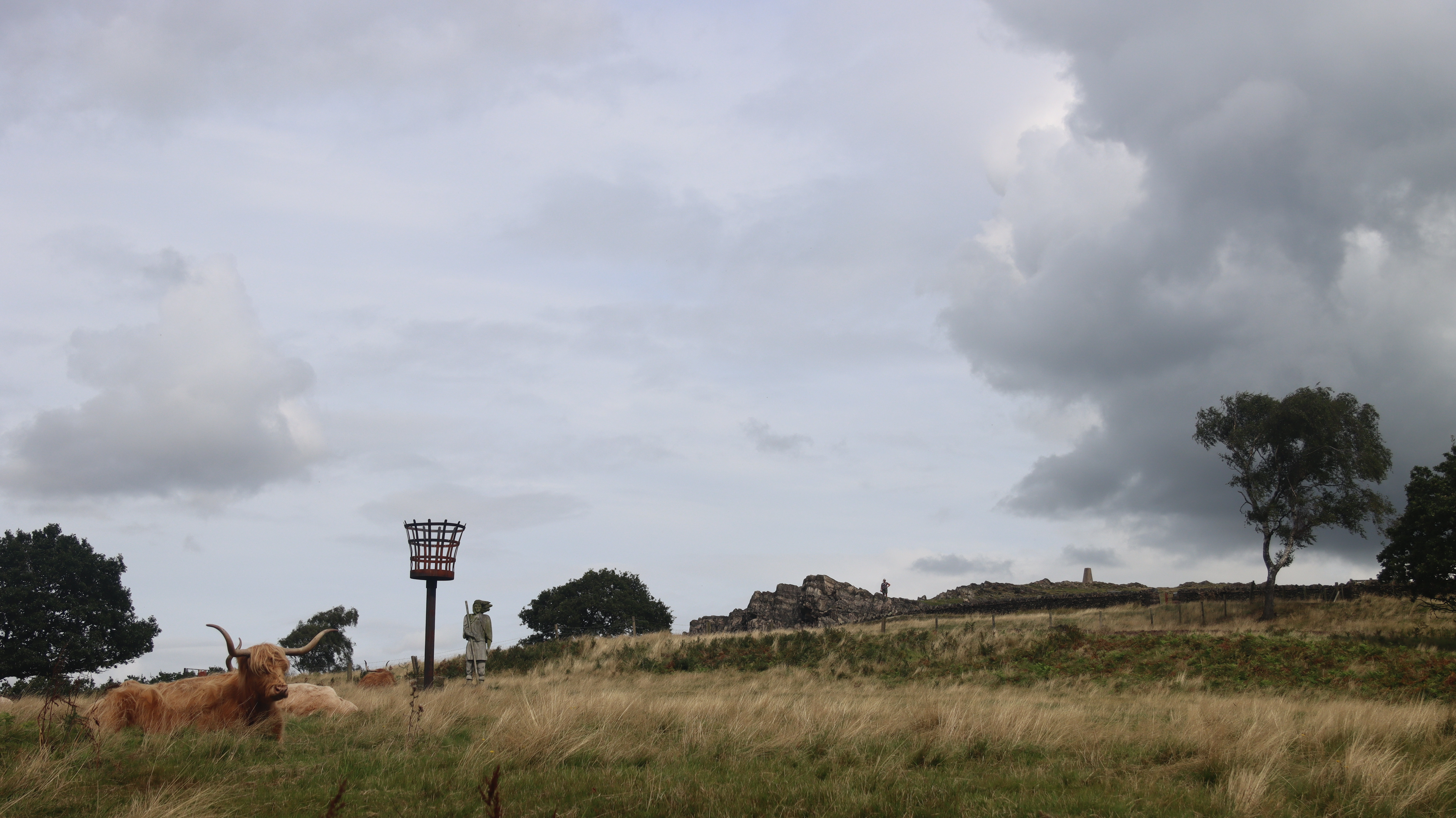 Looking up to the trig point on the hill from Upper car park