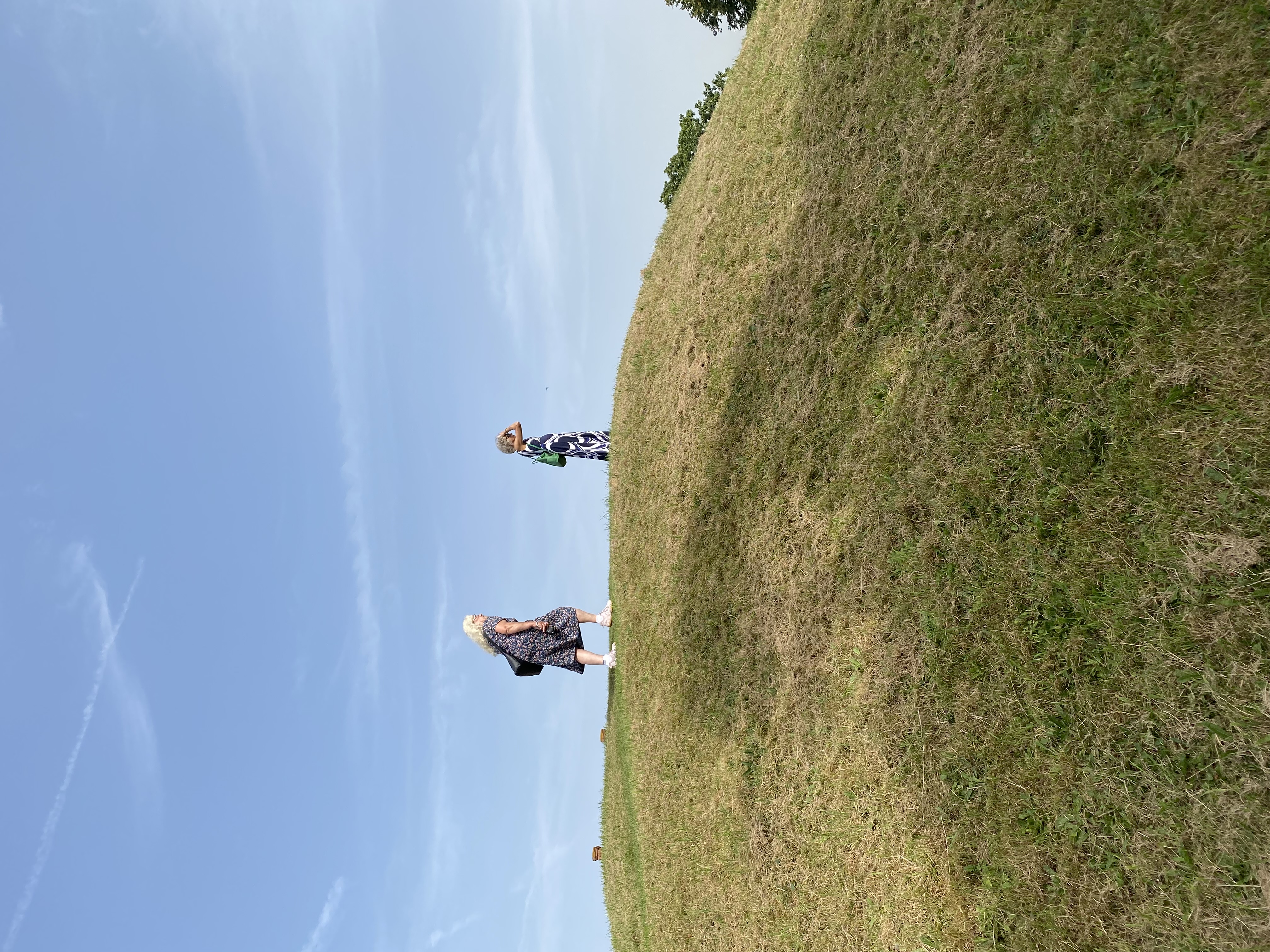 Climbing to the top of the ancient burial mound 