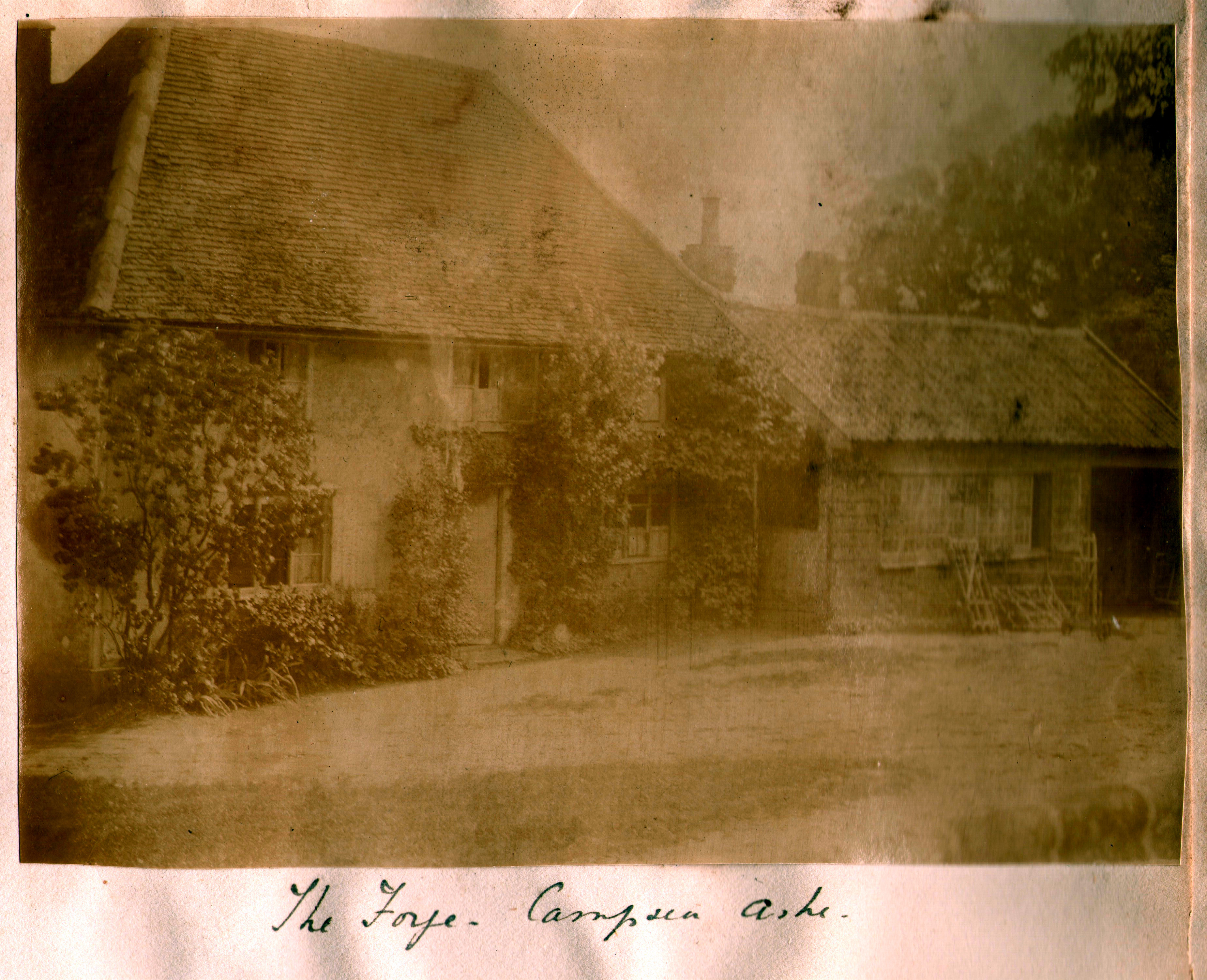 West facing front of Smithy House with the Forge barn on the rhs.