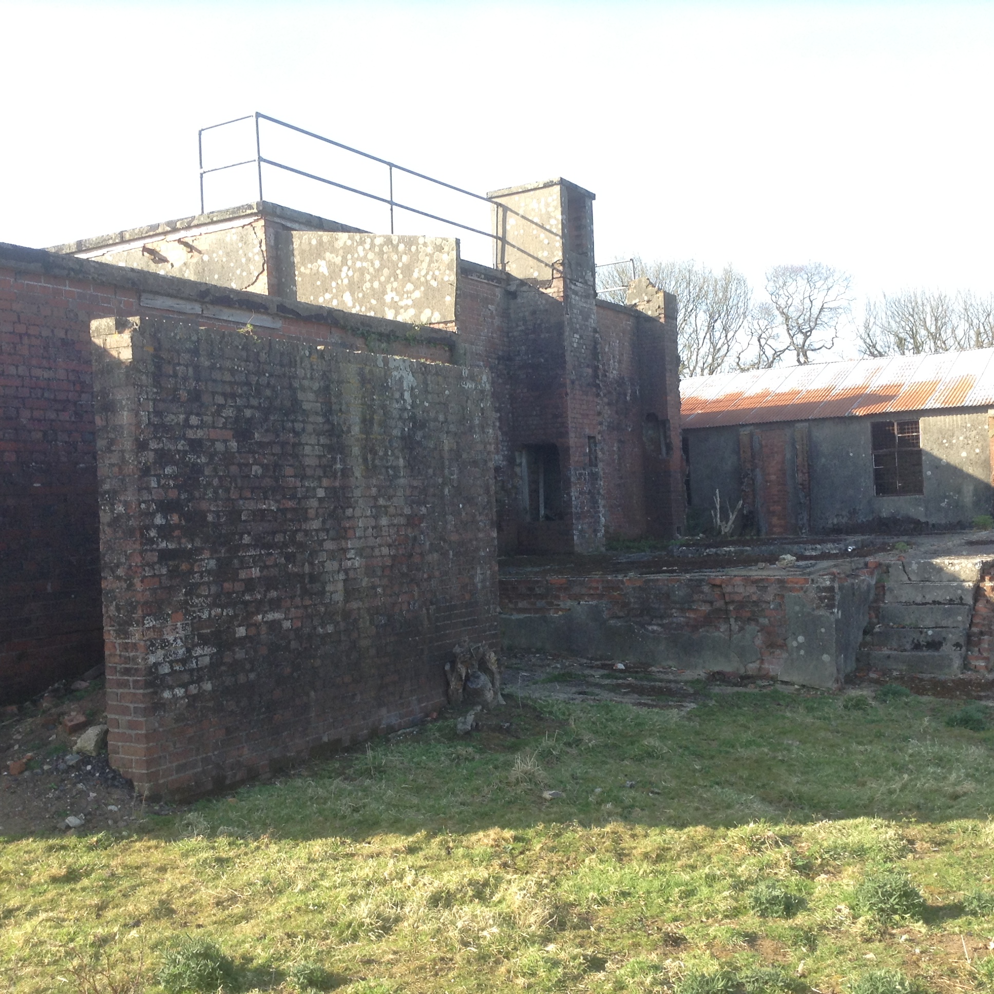 Showing back entrance,behind large blast wall to the left of the photograph. to building 166, Operations block.