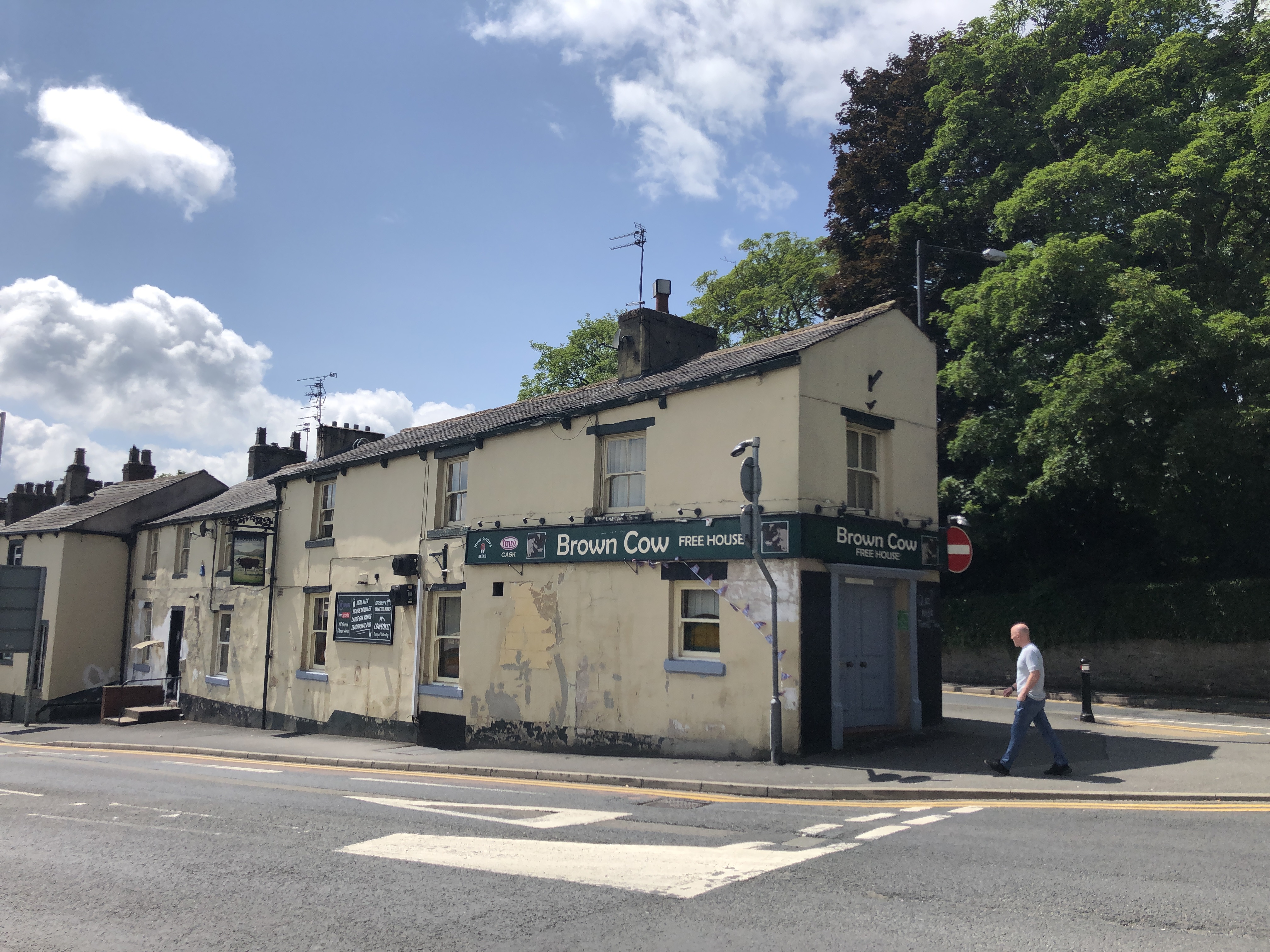 The side view of the pub showing the name