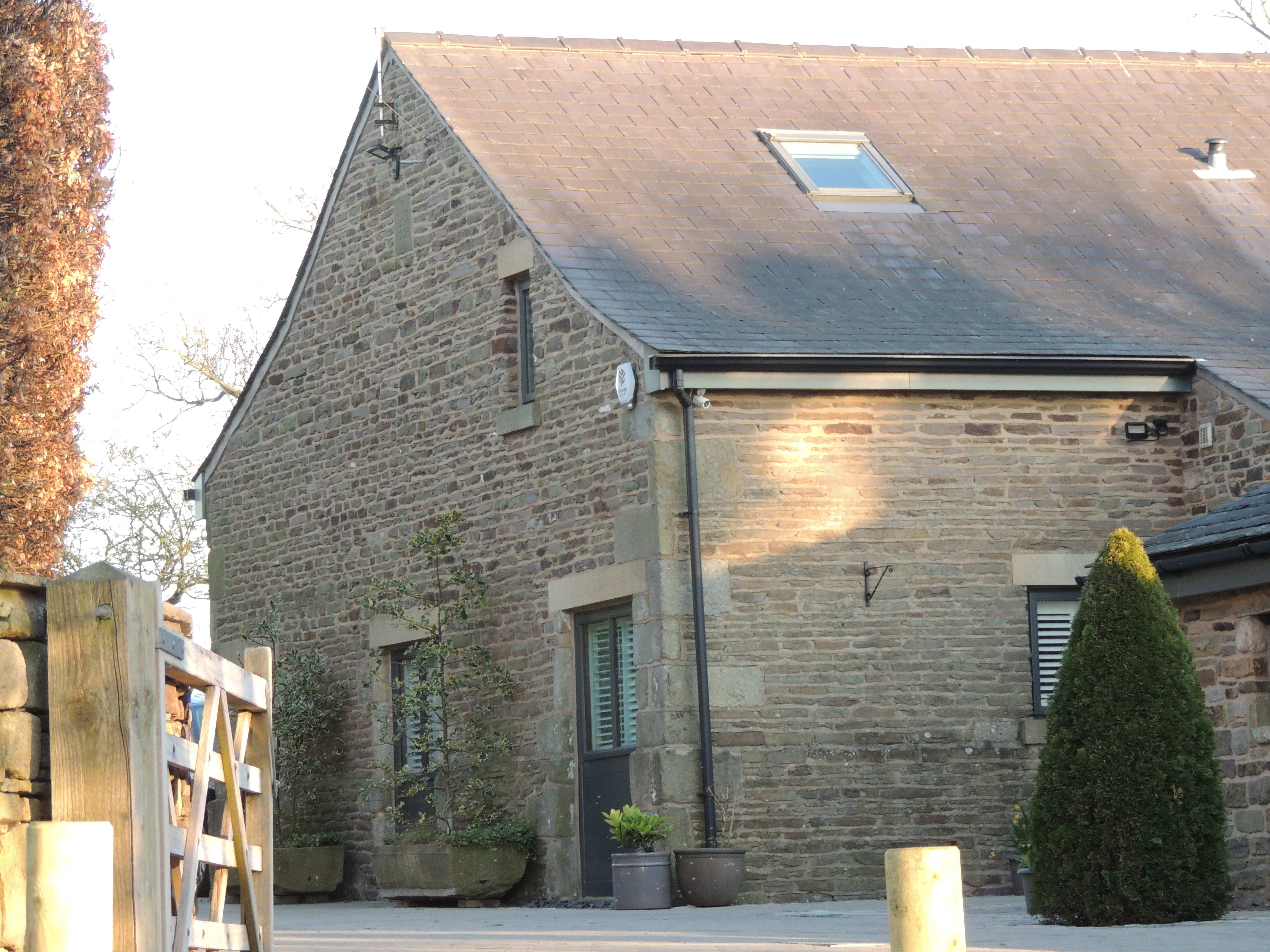 Barn with shippon circa 20 metres south of Eagle Tower Farmhouse, which is dated 1704 on north gable. 