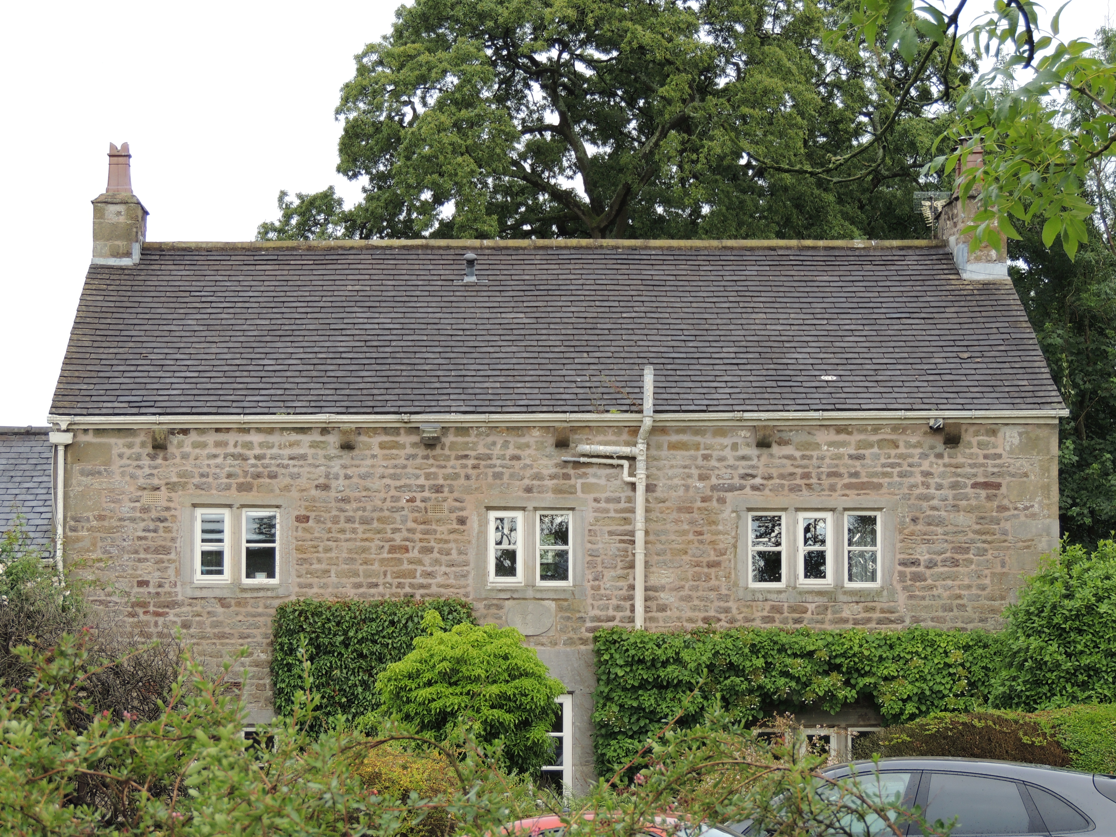 Clifton Hill Home Farmhouse. A house built in 1742. Sandstone rubble with tile roof.