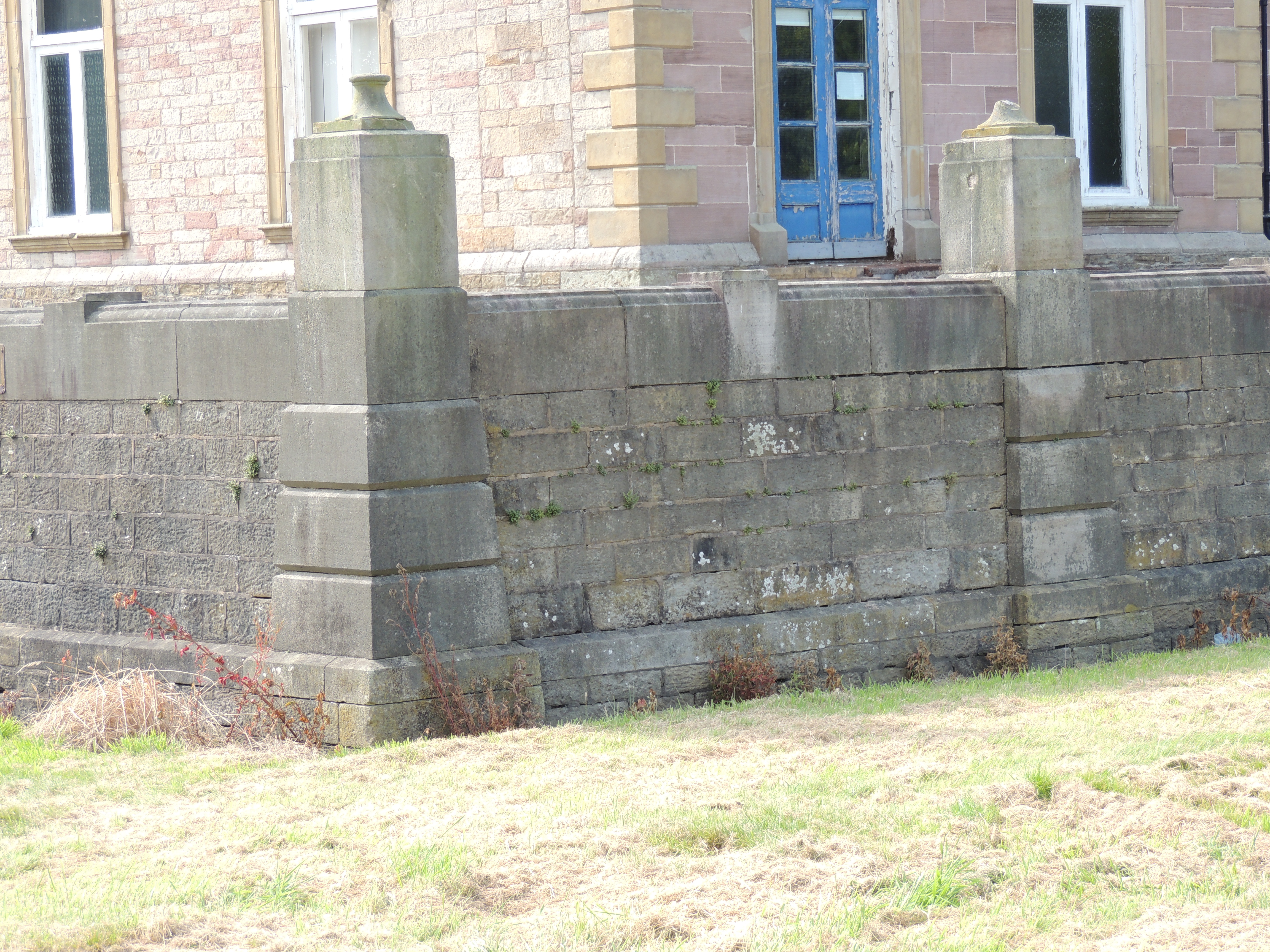 Terrace retaining wall to south and east of Wrightington Hall. Sandstone garden wall from the mid 19th century. 
