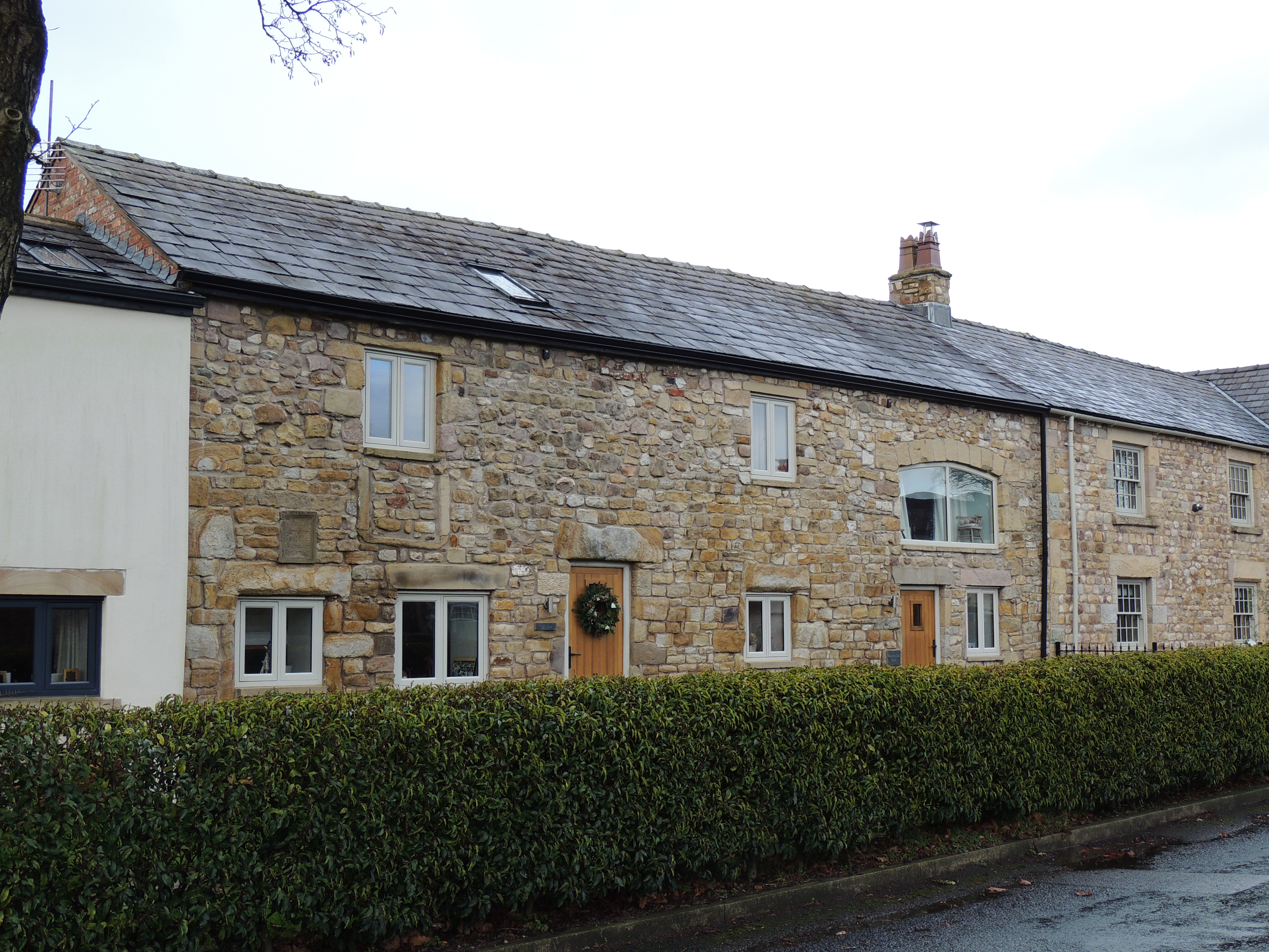 Manor House Farmhouse & attached barn in Inglewhite. A farmhouse & attached barn, the latter dated 1726. 