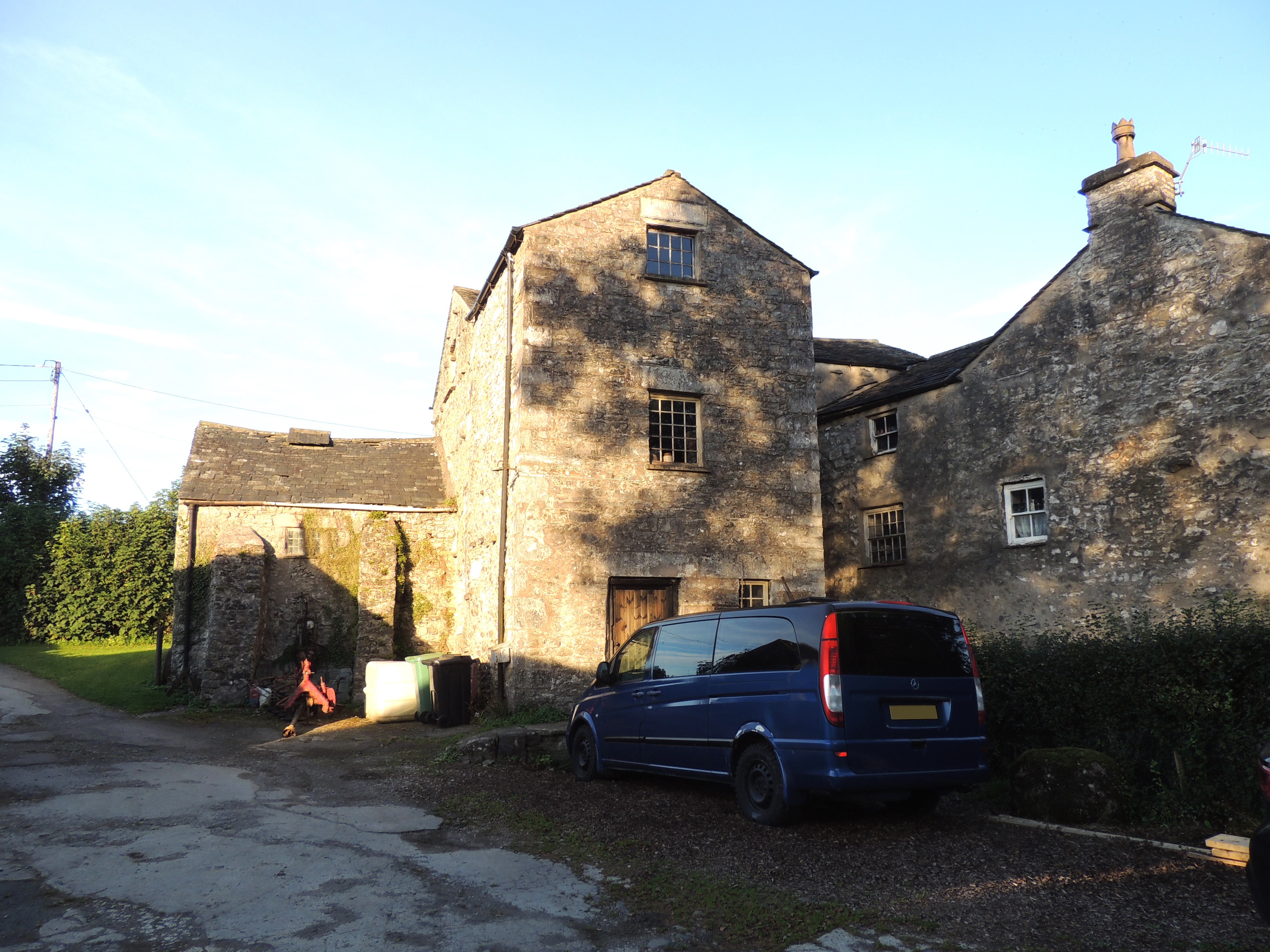 Milton Mill House and attached Mill to rear. Adjacent extension with date and initials JW Esq 1863