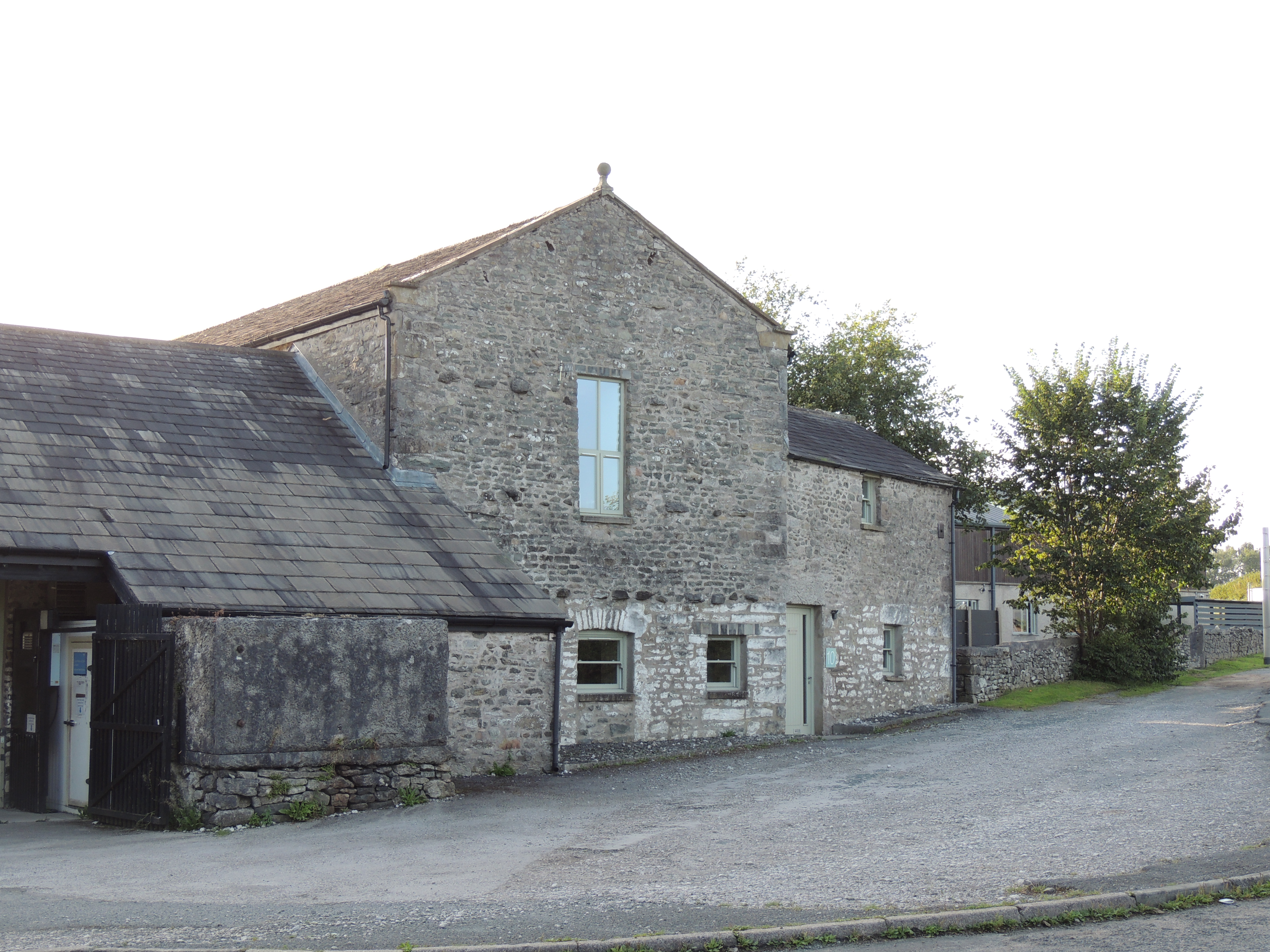 Former barn with cow house under, waggon shed and stores approximately 70 metres North of Moss End Farmhouse.