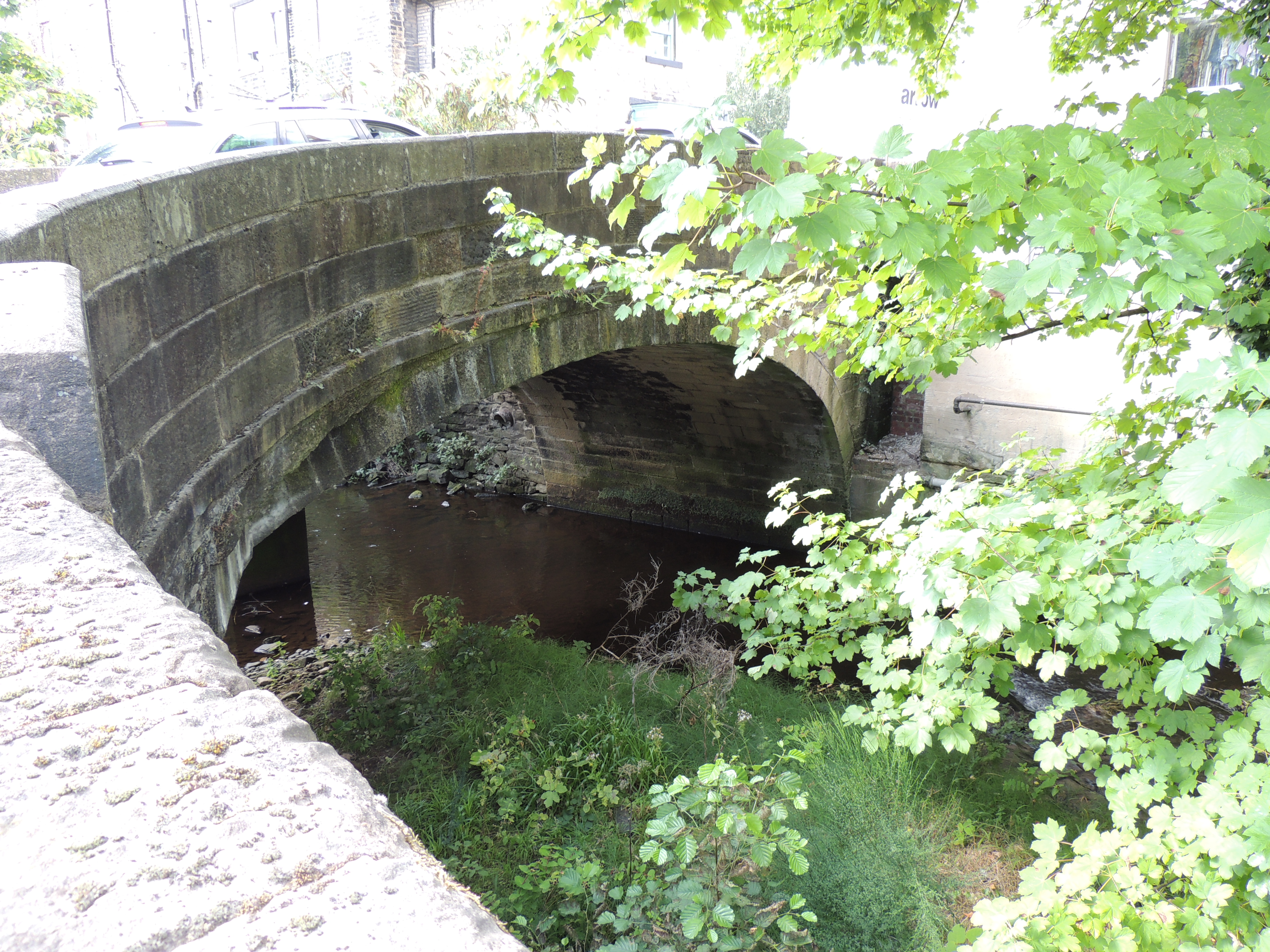 Hollowgate Bridge in Holmfirth. A road bridge from the early 19th century that crosses the River Holme. 