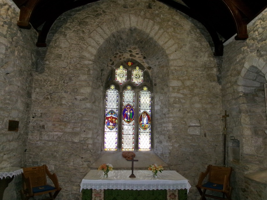5. Chancel east end, showing altar in the sanctuary and east window with stained glass.