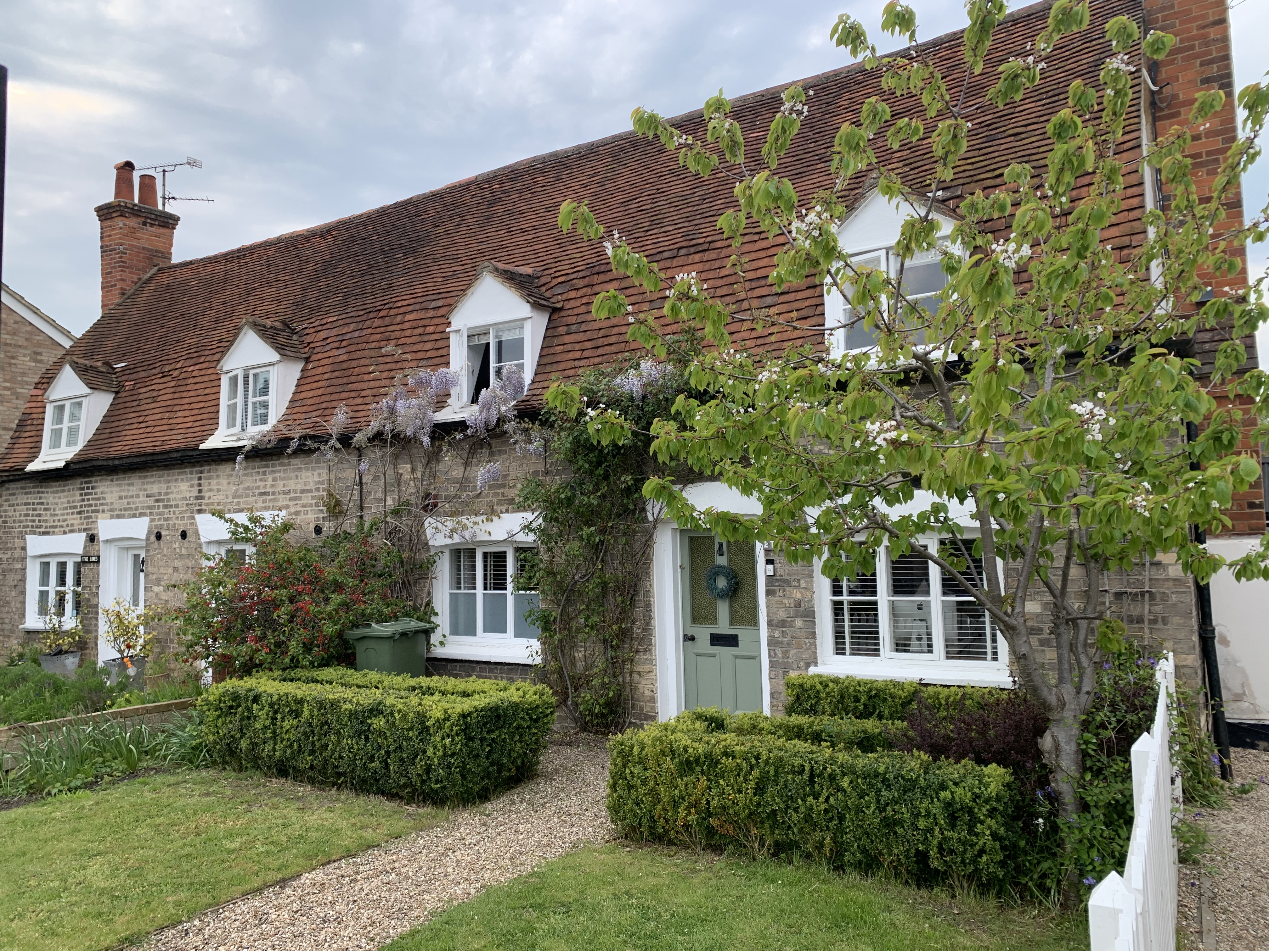 Photo taken in June 2023 showing front of the two cottages, 1 and 2 The Limes, The Street, Hatfield Peverel, Essex.