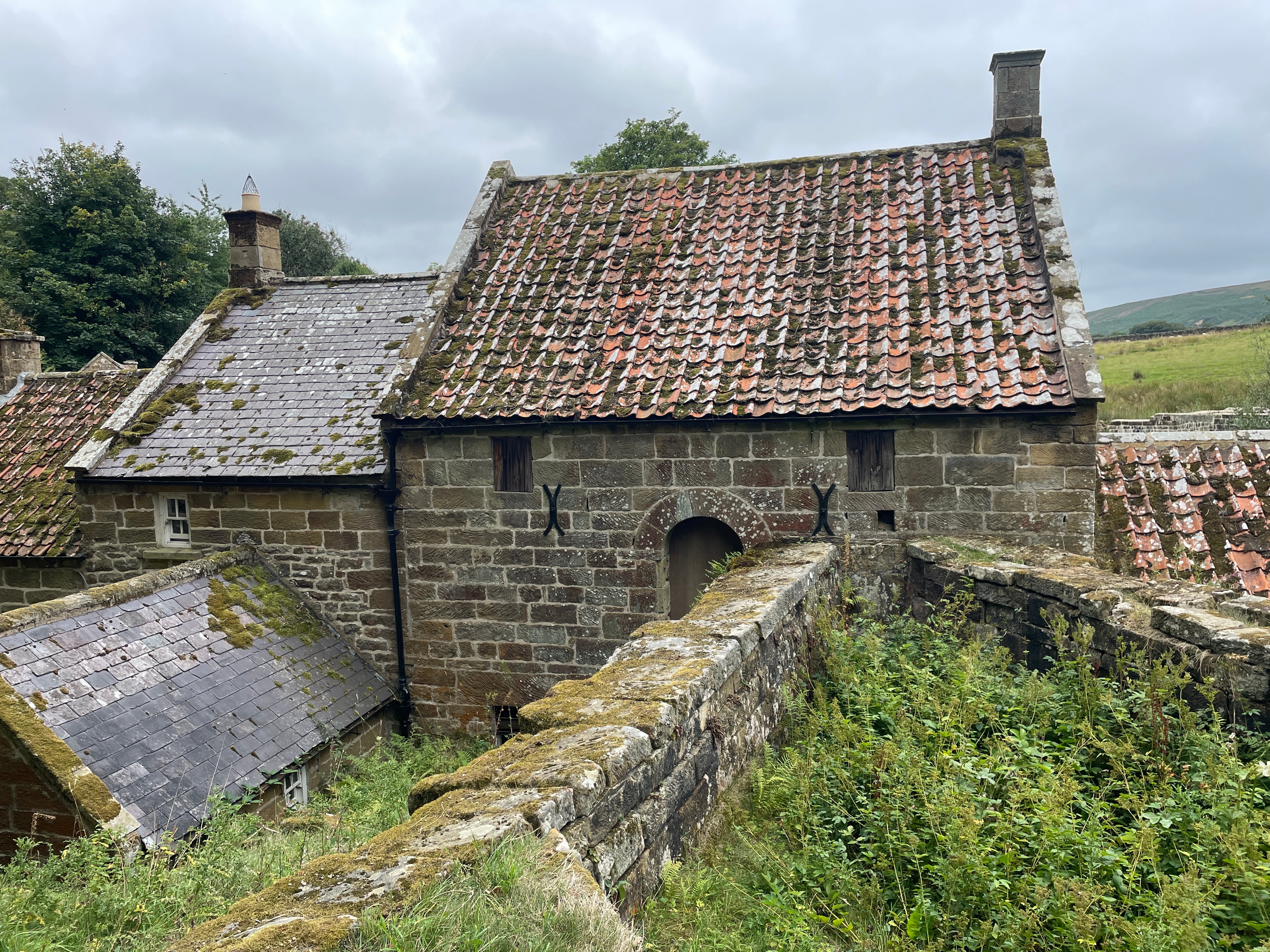 Bransdale Mill, a stone building in a North Yorks Moors valley.