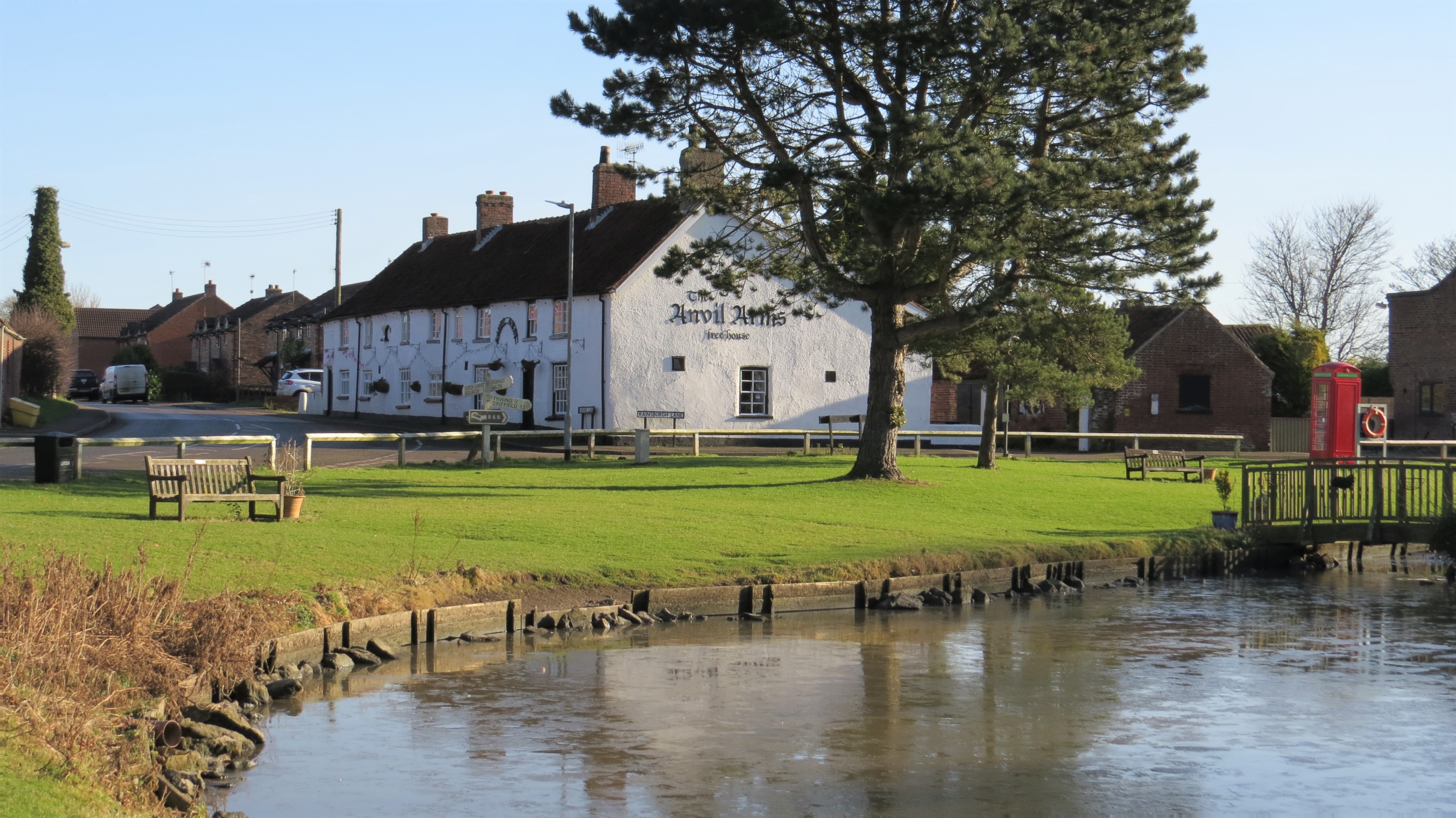 The Anvil Arms inn is pictured in winter sunshine.