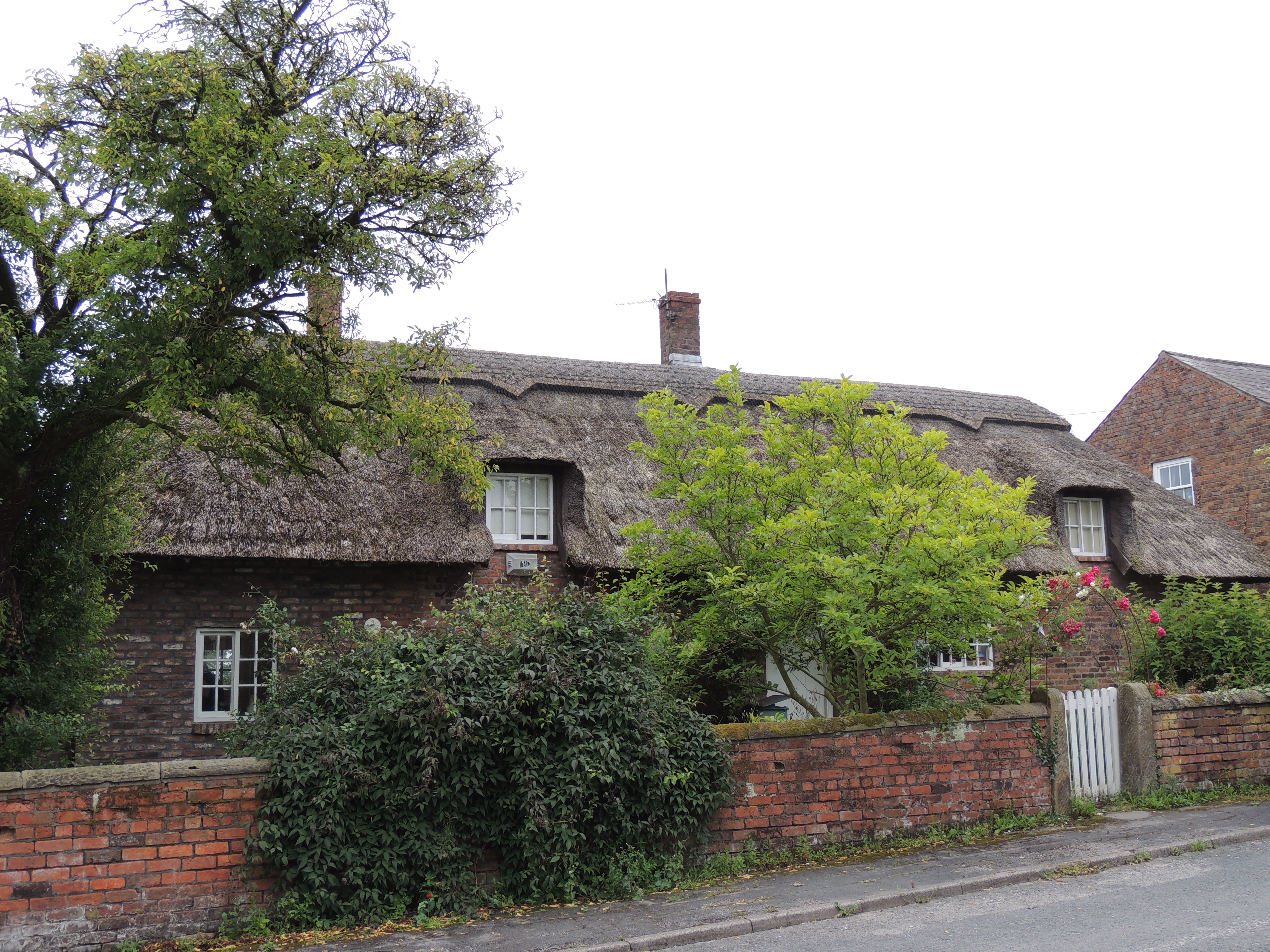 Dagger Cottage, Newton with Scales. Cruck-framed cottage, dated 1653 on spice cupboard, renovated and altered.