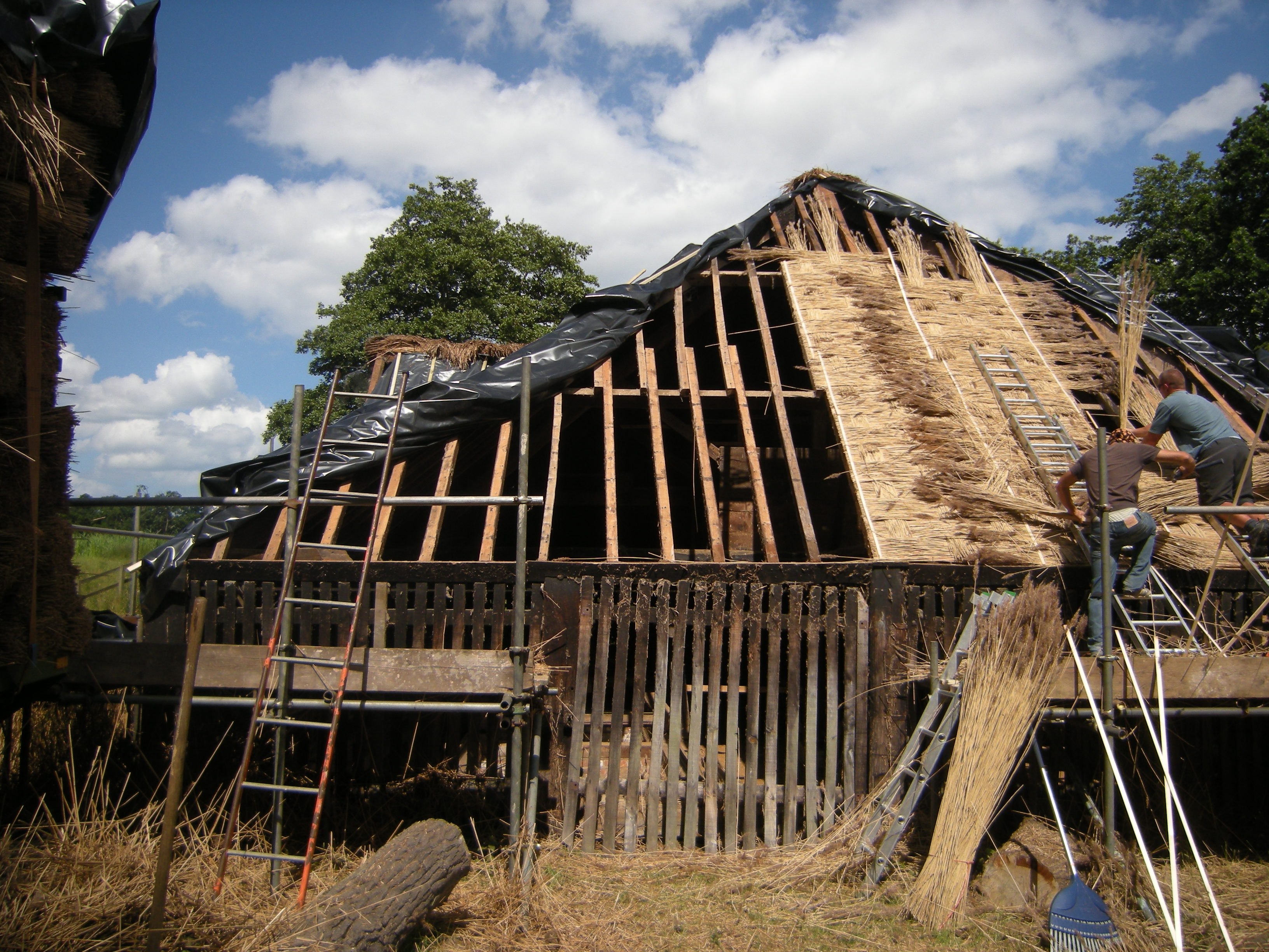 New thatch being applied in 2013