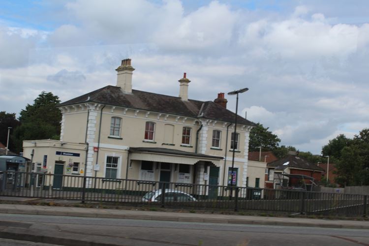 MAIN STATION BUILDING INCLUDING BOOKING HALL ON DOWNSIDE AT WOOLSTON ...