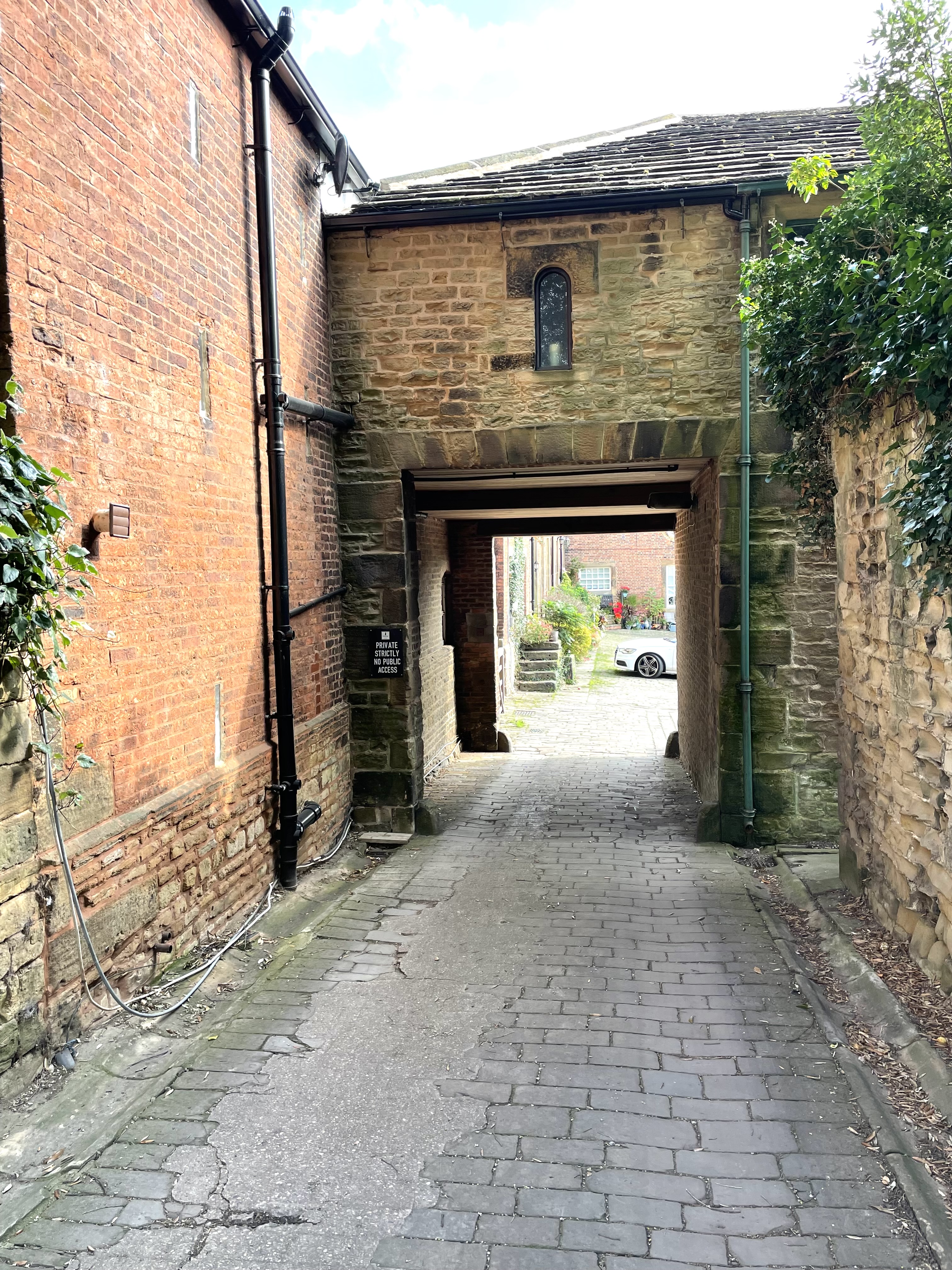 Through passage at north end of Coach House.