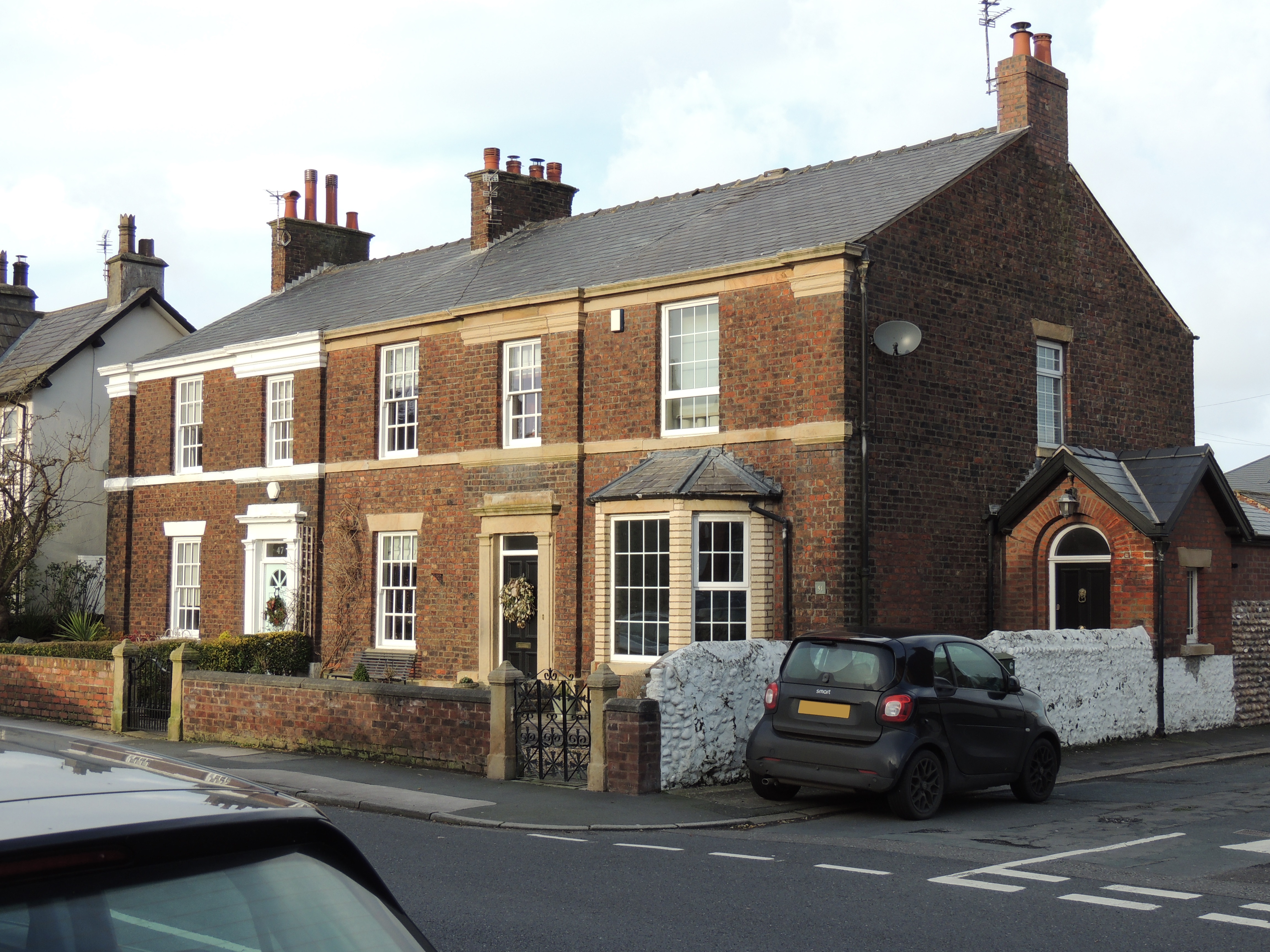 Numbers 47, 49 & 51 Warton Street, Lytham (North side). Terrace of 3 small town houses, circa 1850 to 1860.