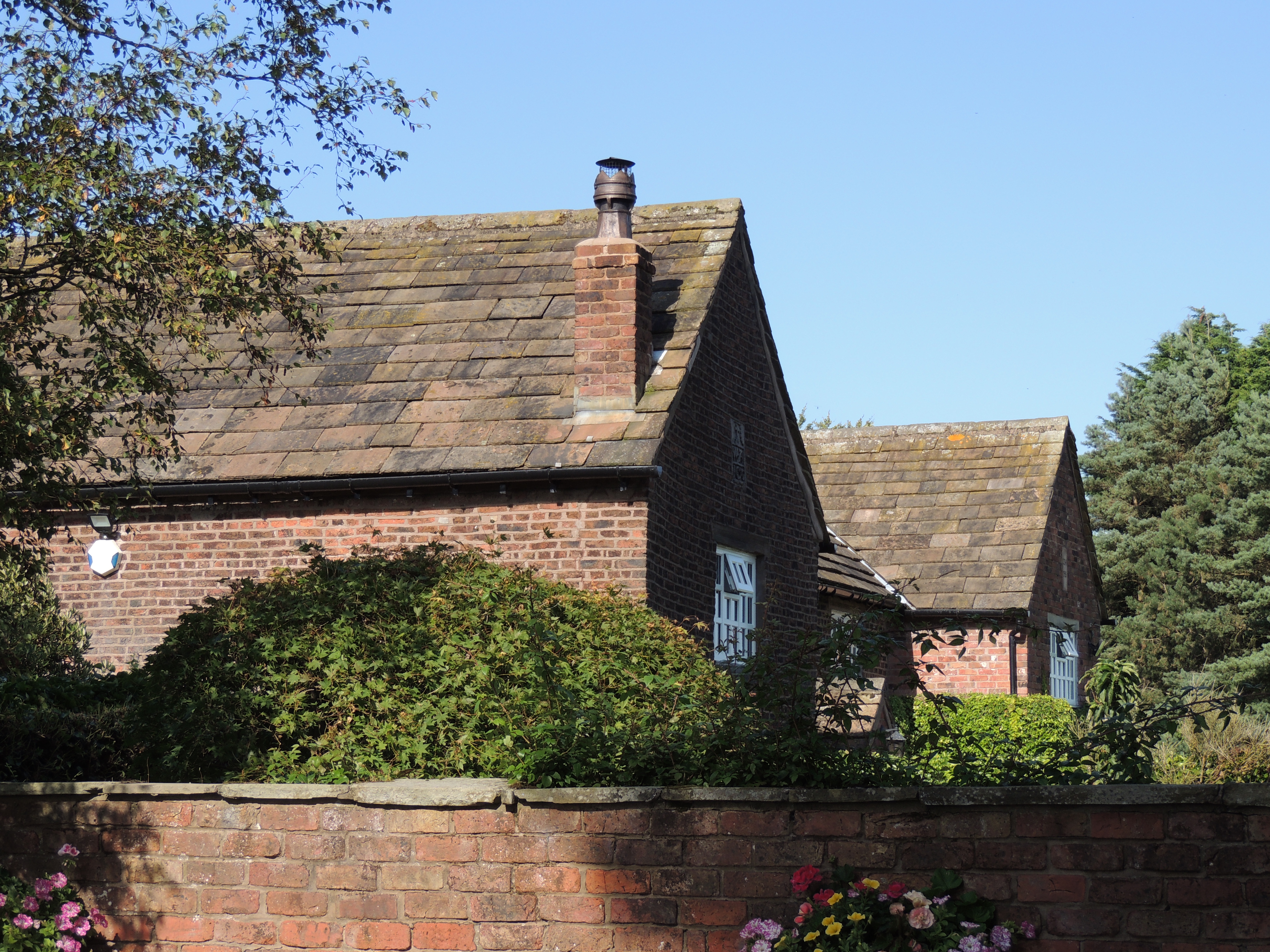 Jumps Farmhouse, Lathom. Farmhouse, now house and extended. Dated 1690 in gable of wing.