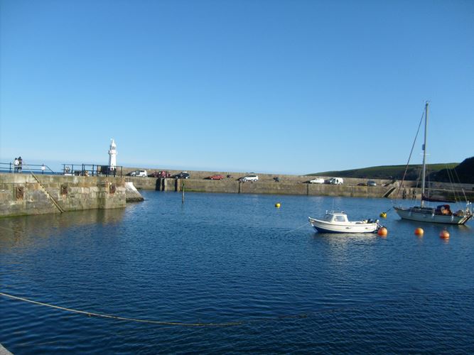 HARBOUR PIERS AND QUAYS, Mevagissey - 1210773 | Historic England