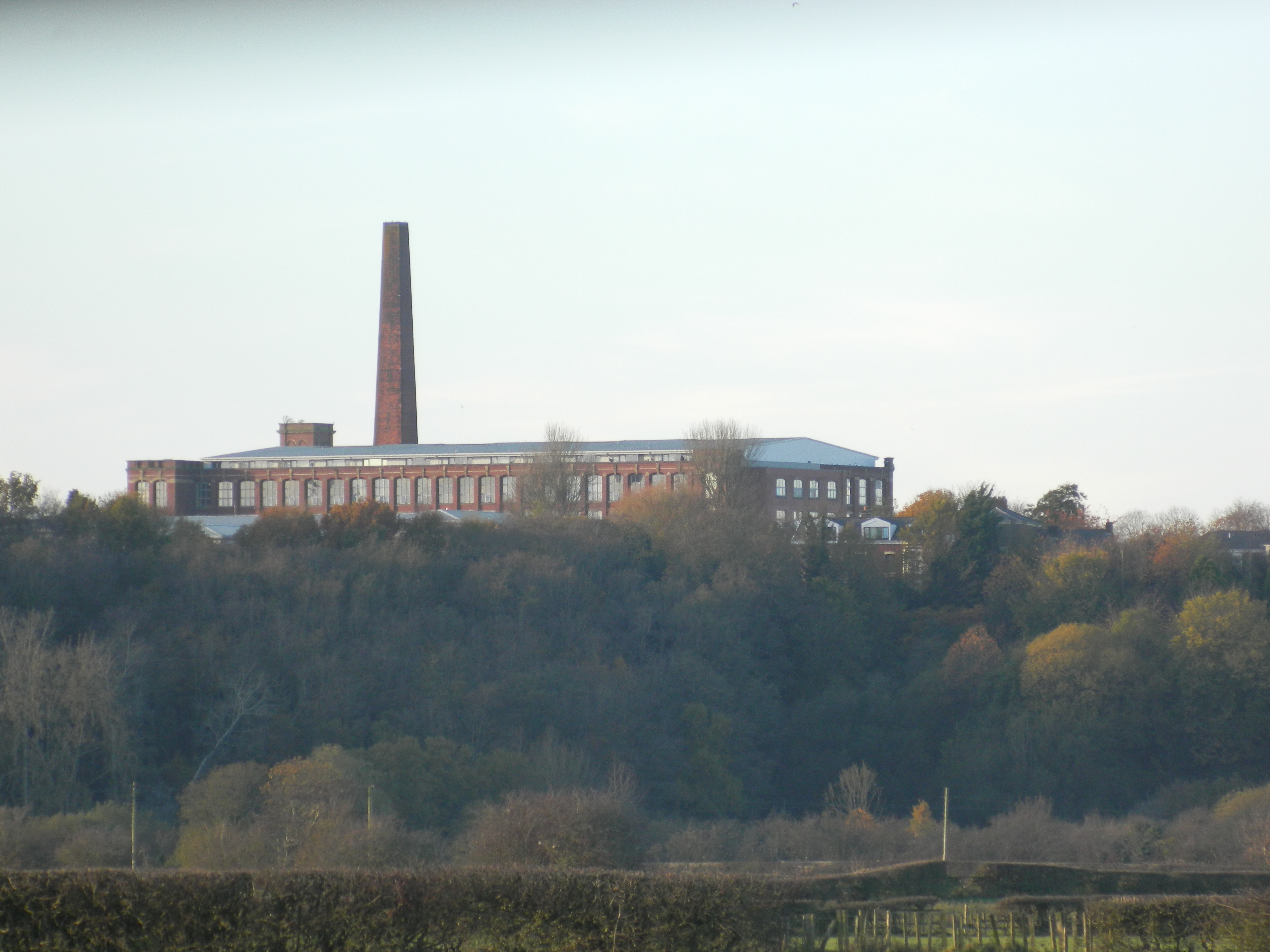 Horrocks' Centenary Mill on New Hall Lane viewed from the bank of the River Ribble at Fishwick Bottoms.