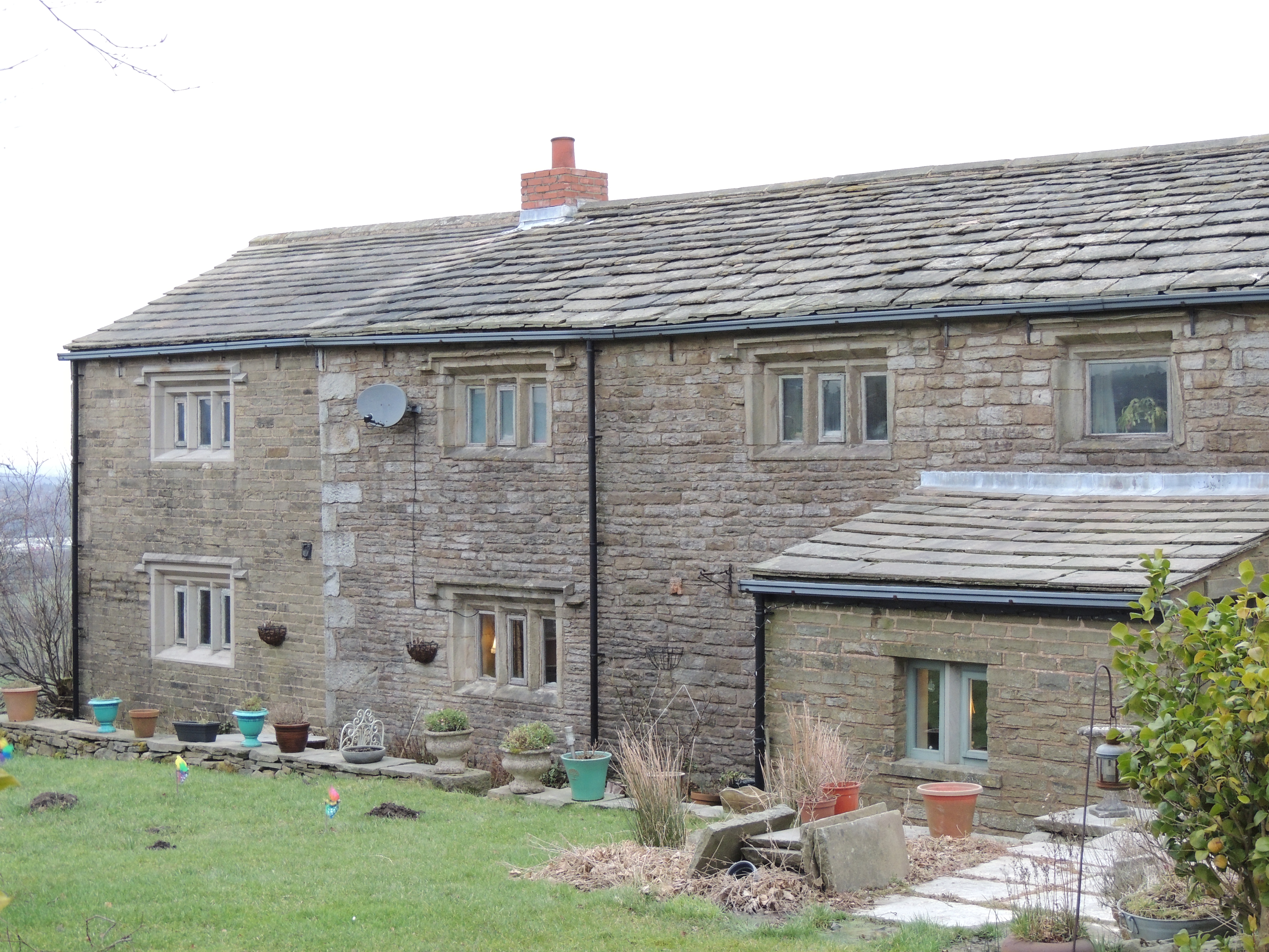 Sniddleholme Farm in Blackburn with Darwen. A farmhouse that is dated 1656 on porch and is now a house. 