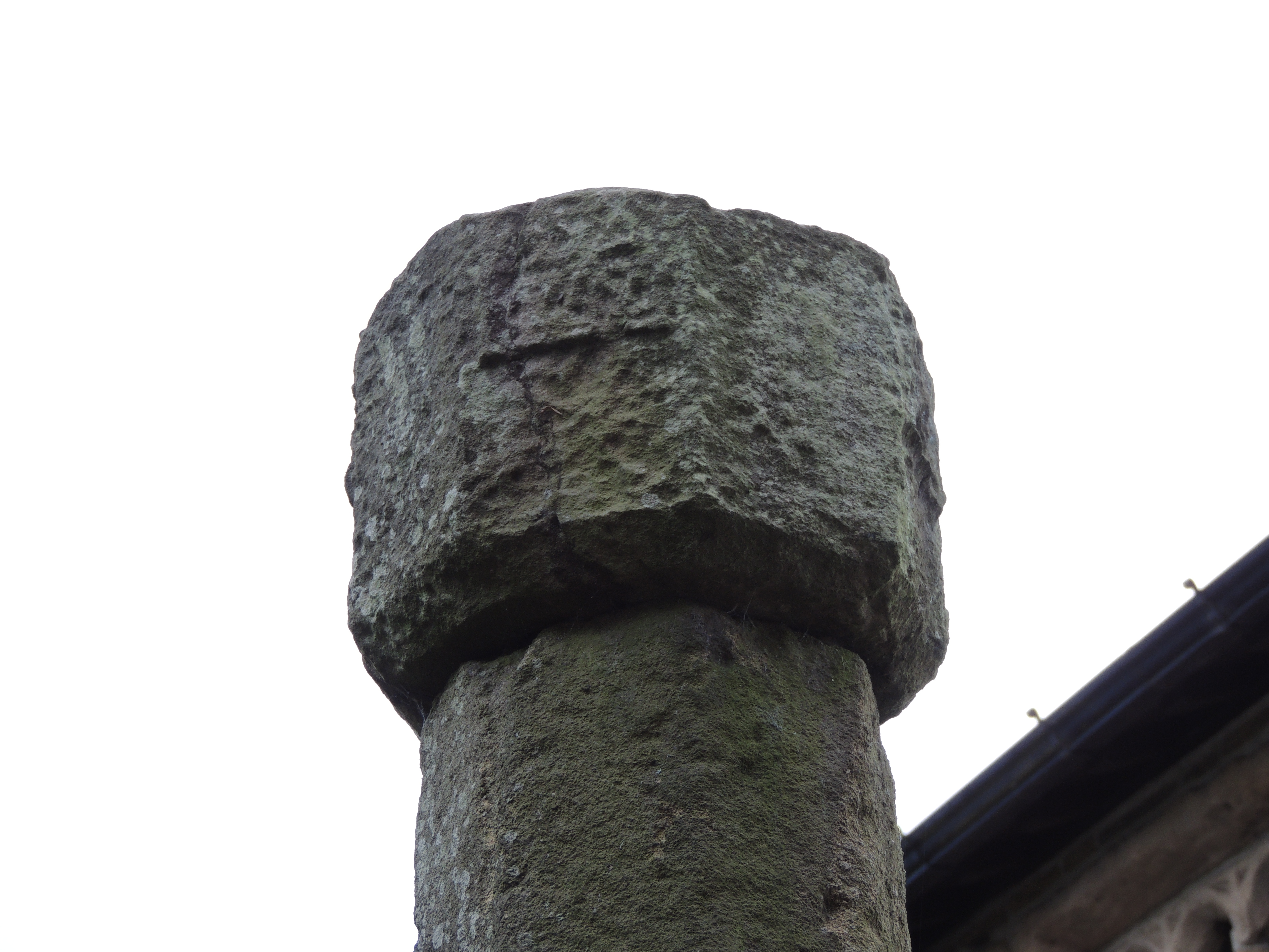 Medieval Cross in St Bartholomew's Churchyard at Colne. Photographed in July 2025.