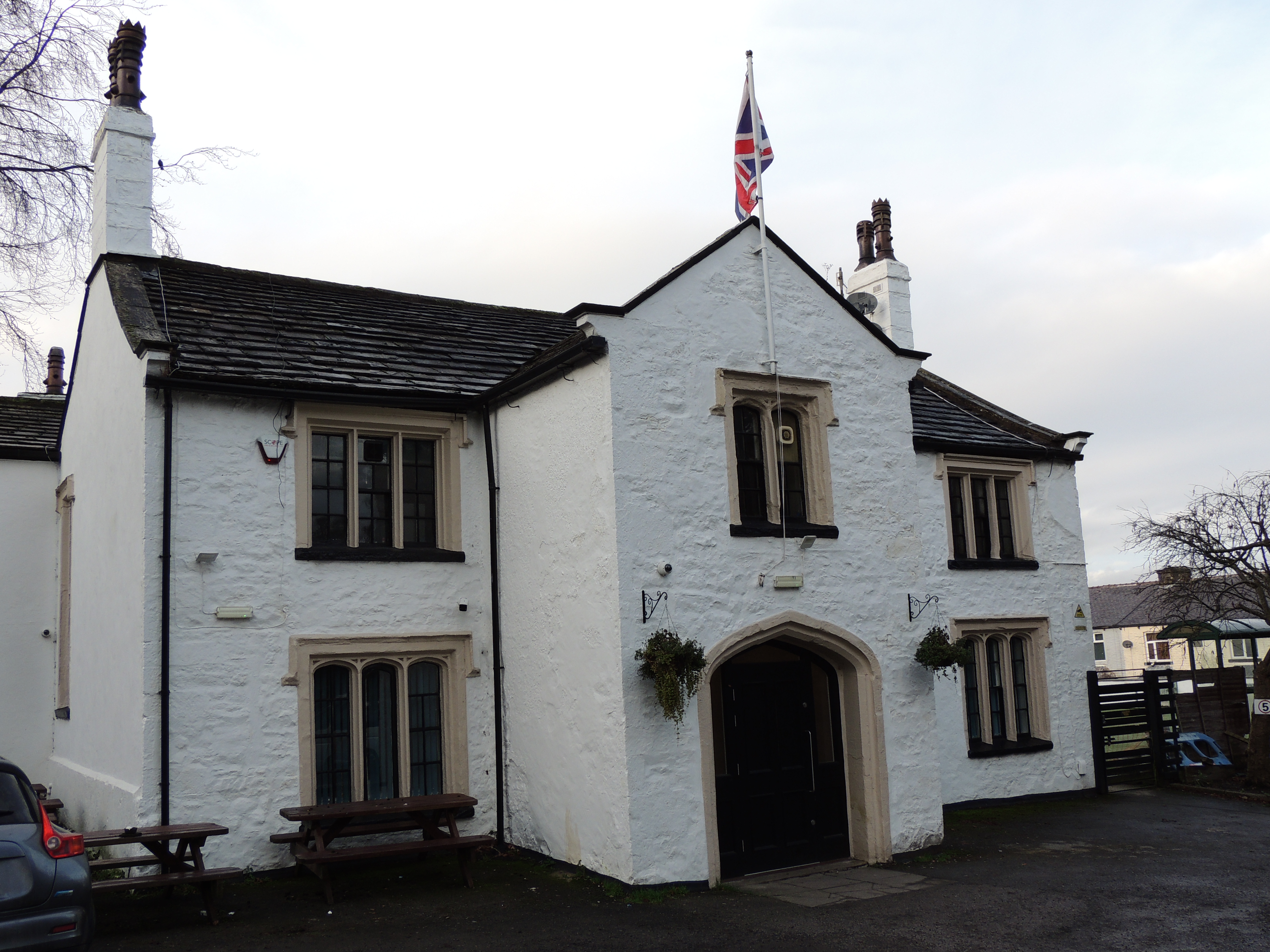 Number 163 Manchester Road, Burnley, Green Hill Bowling Club. A former farmhouse, probably from the early 17th century.