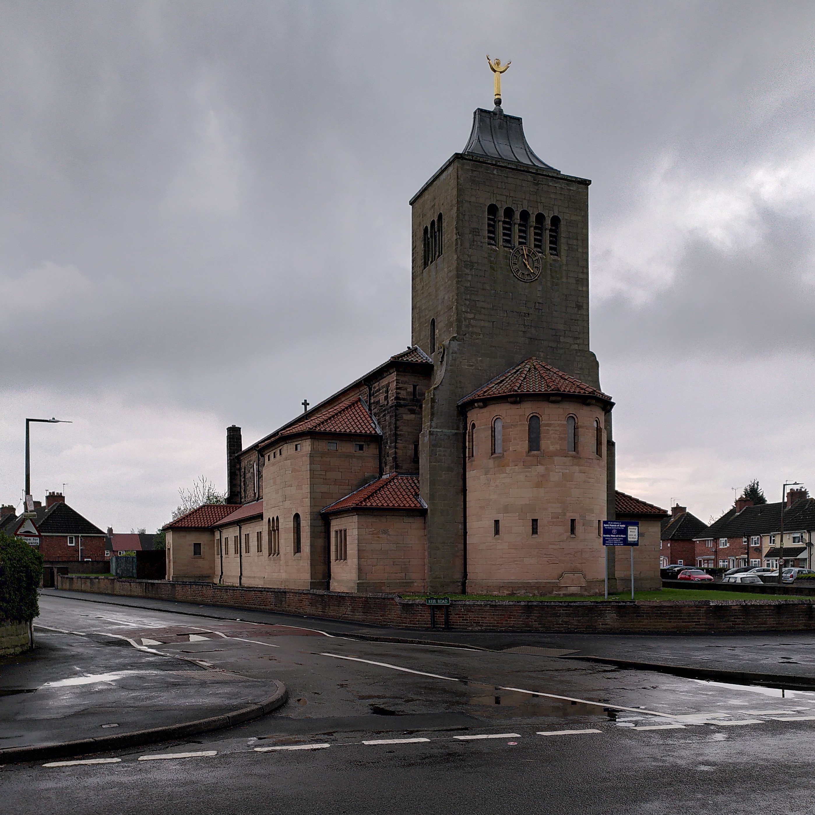 St Francis of Assisi church seen from the east, the tower, rising above the apse, topped by a gilded statue of the saint