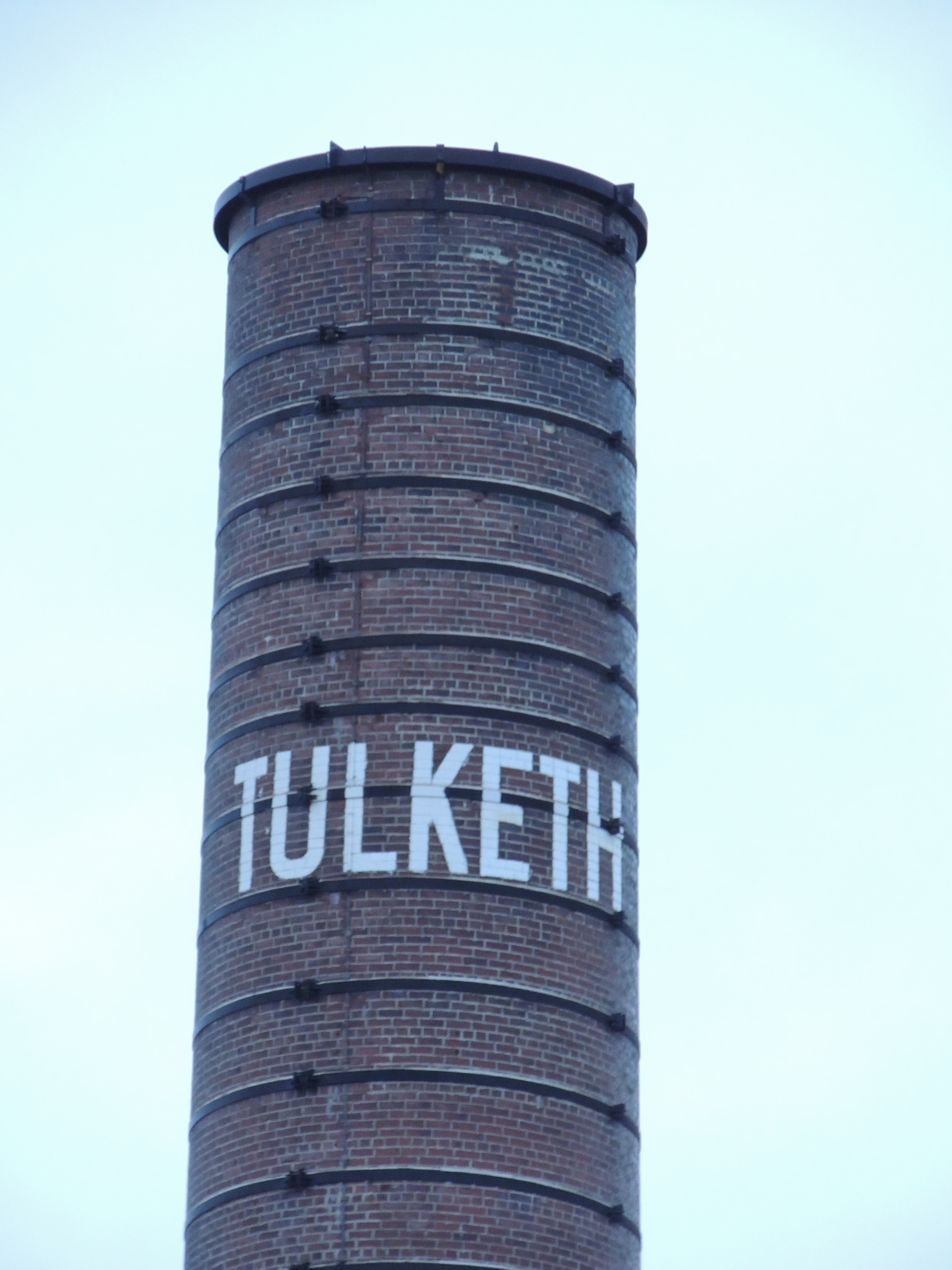 Chimney to former cotton mill, approx. 20 metres south of Tulketh Mill. Built in 1905.