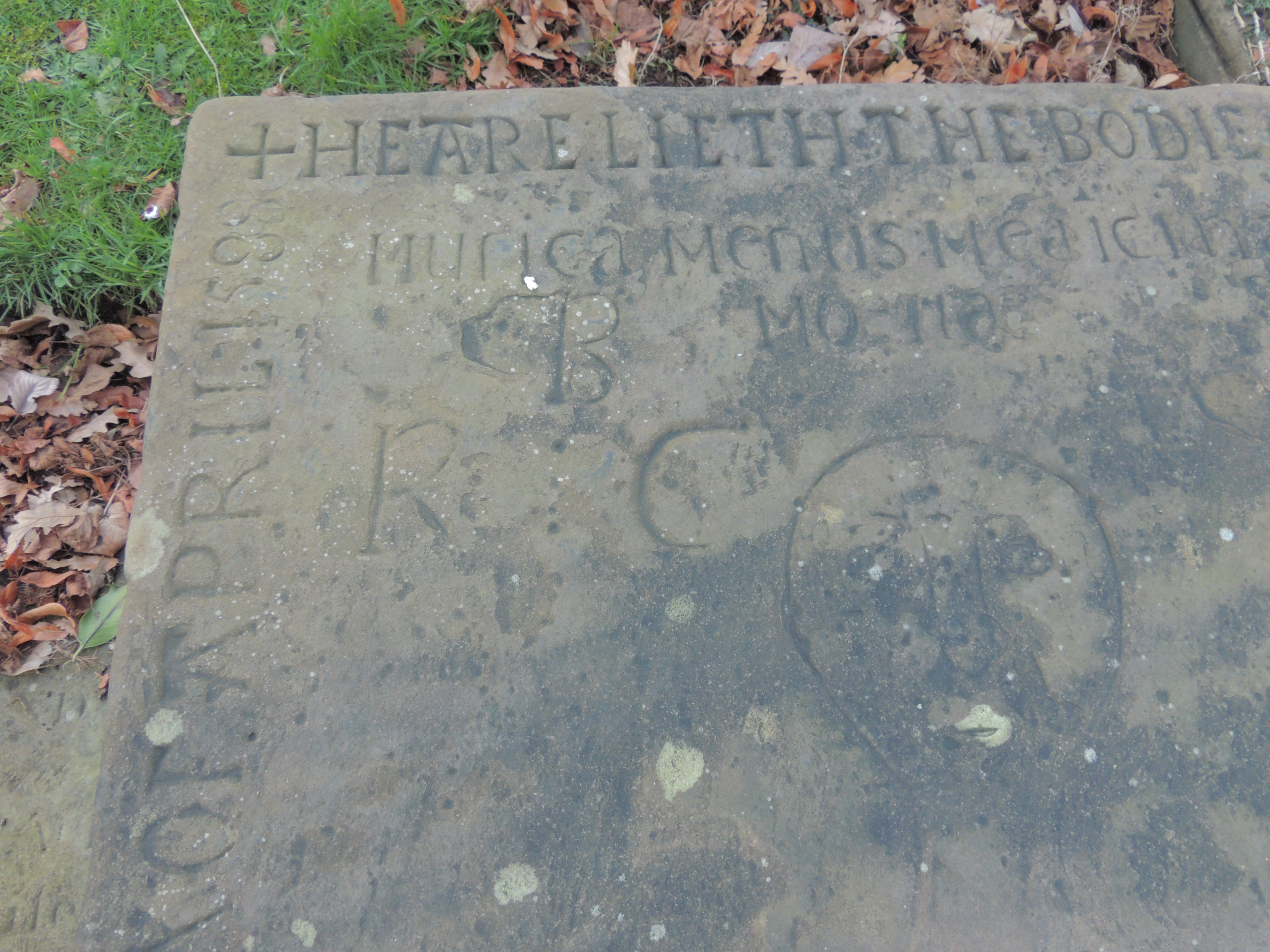 Walker Monument, probably 1588. A raised monumental slab, 20 Metres South of Chancel of Church of St Andrew in Leyland.