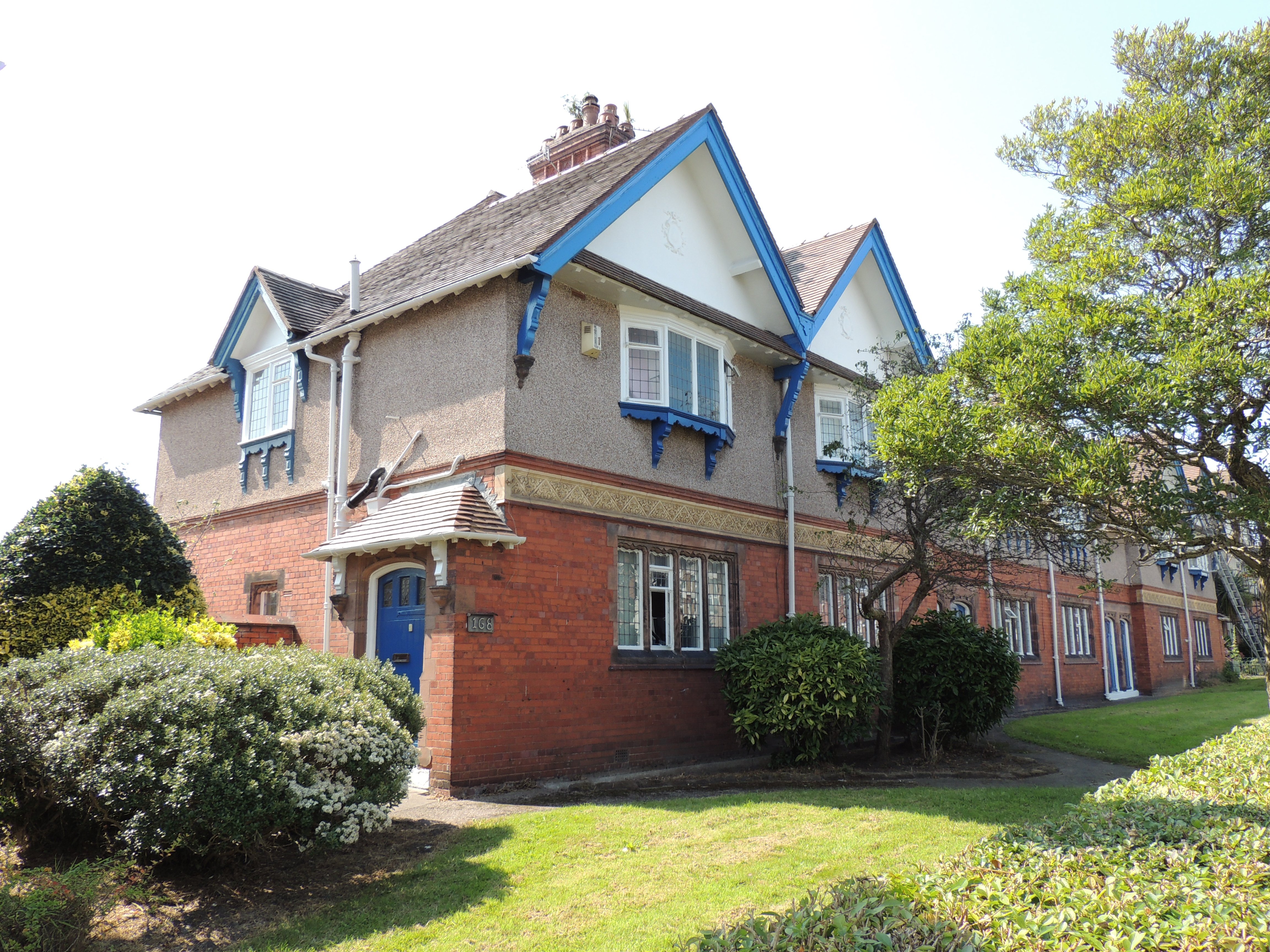Numbers 158 to 168 (even) New Chester Road (west side), Port Sunlight. Terrace of 6 houses, built 1899, by H. Beswick. 