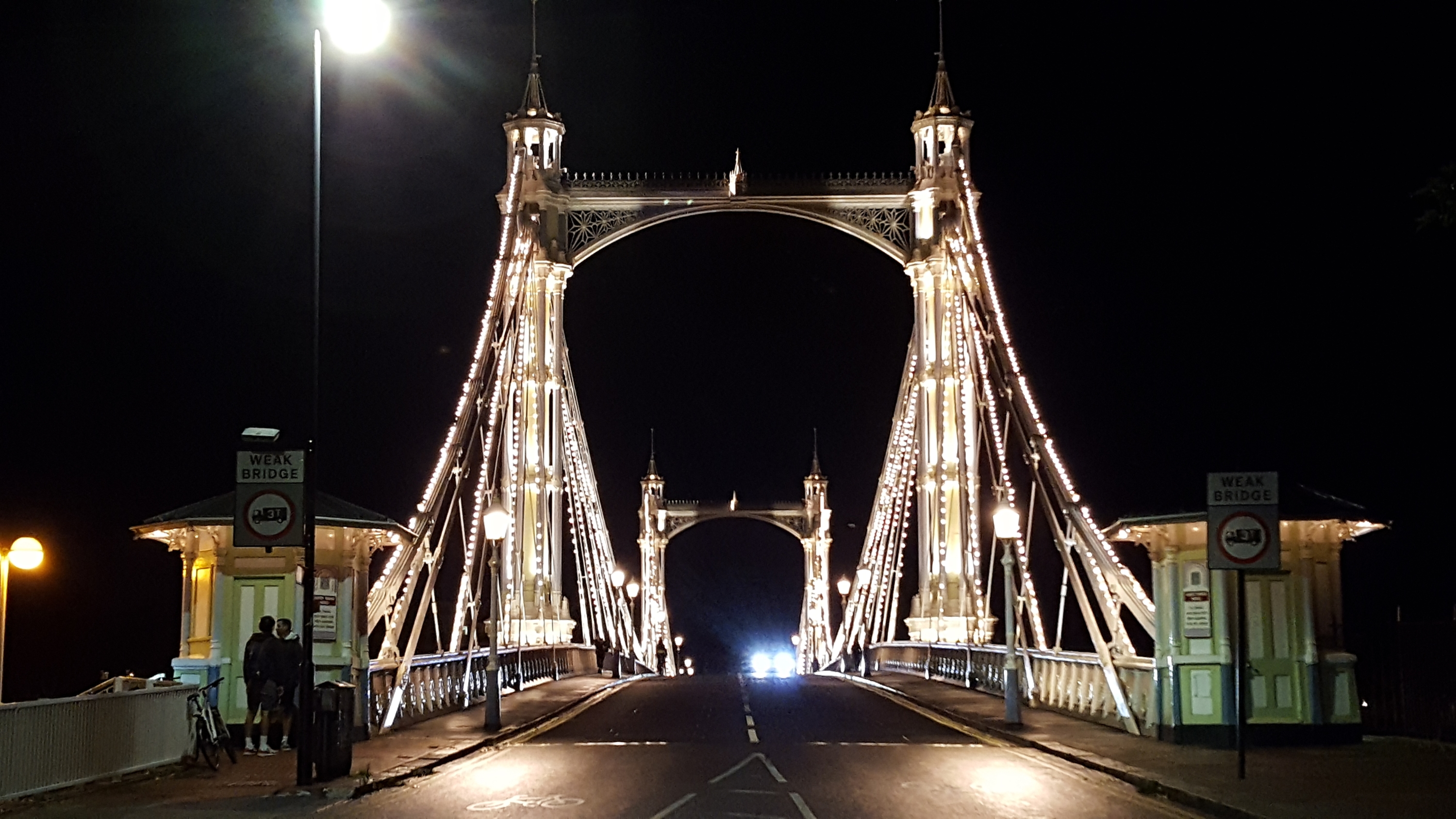 Albert Bridge including tollbooths lamp standards and stairs and