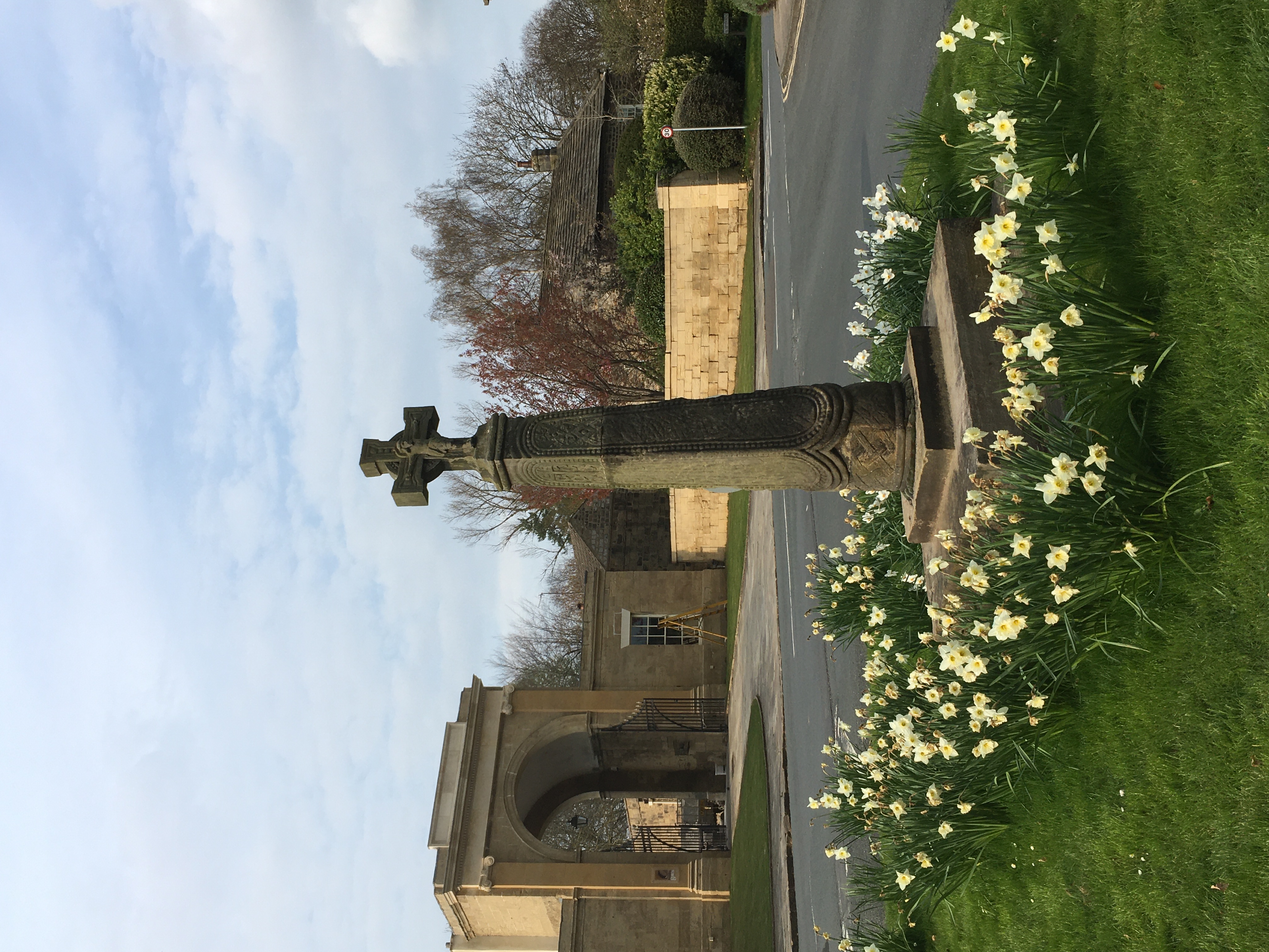 Front of Saxon Cross at Follifoot with Rudding Park gate in the background. Taken 14 April 2022