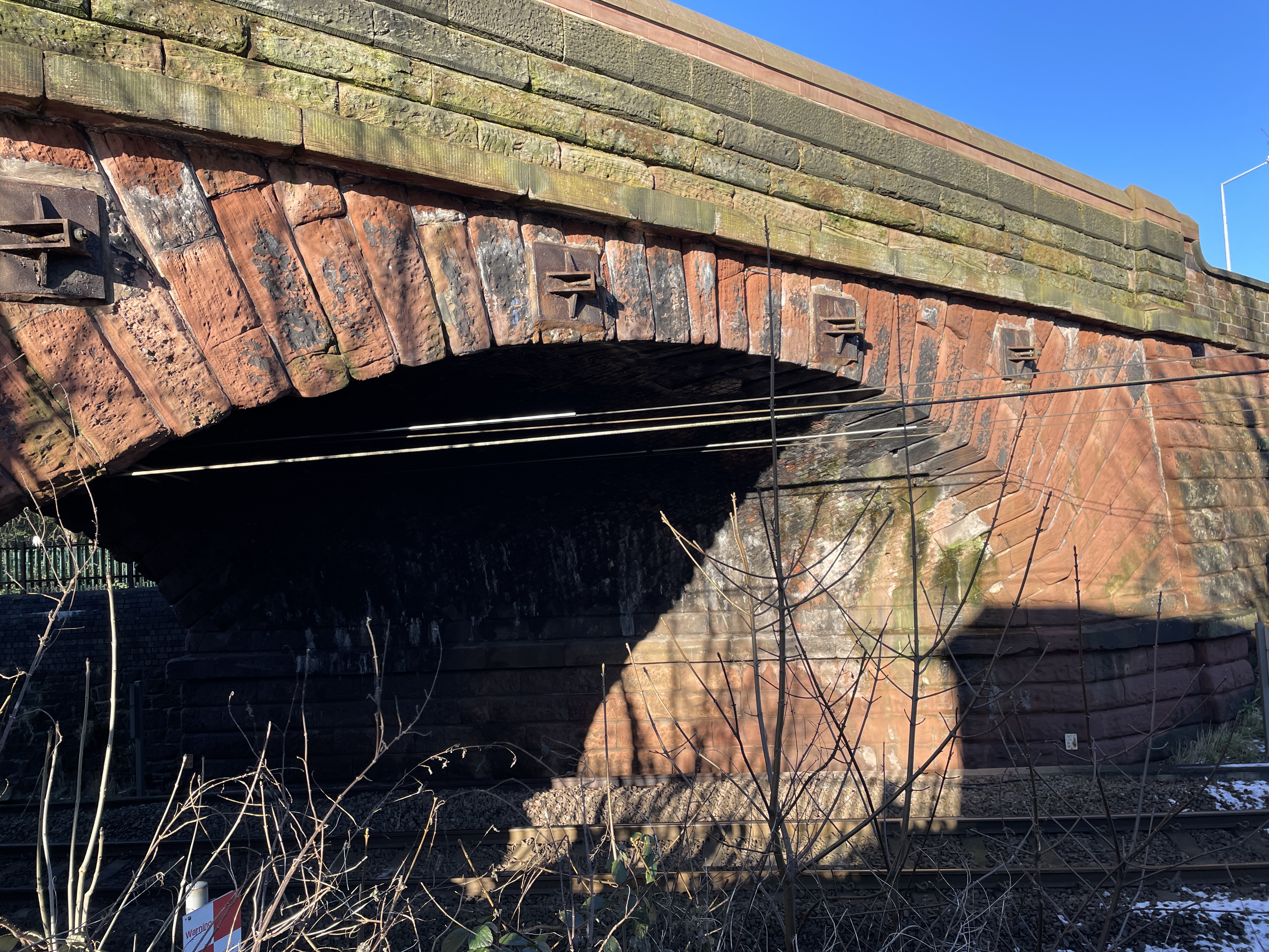 The arch of Ropers Bridge over the railway line