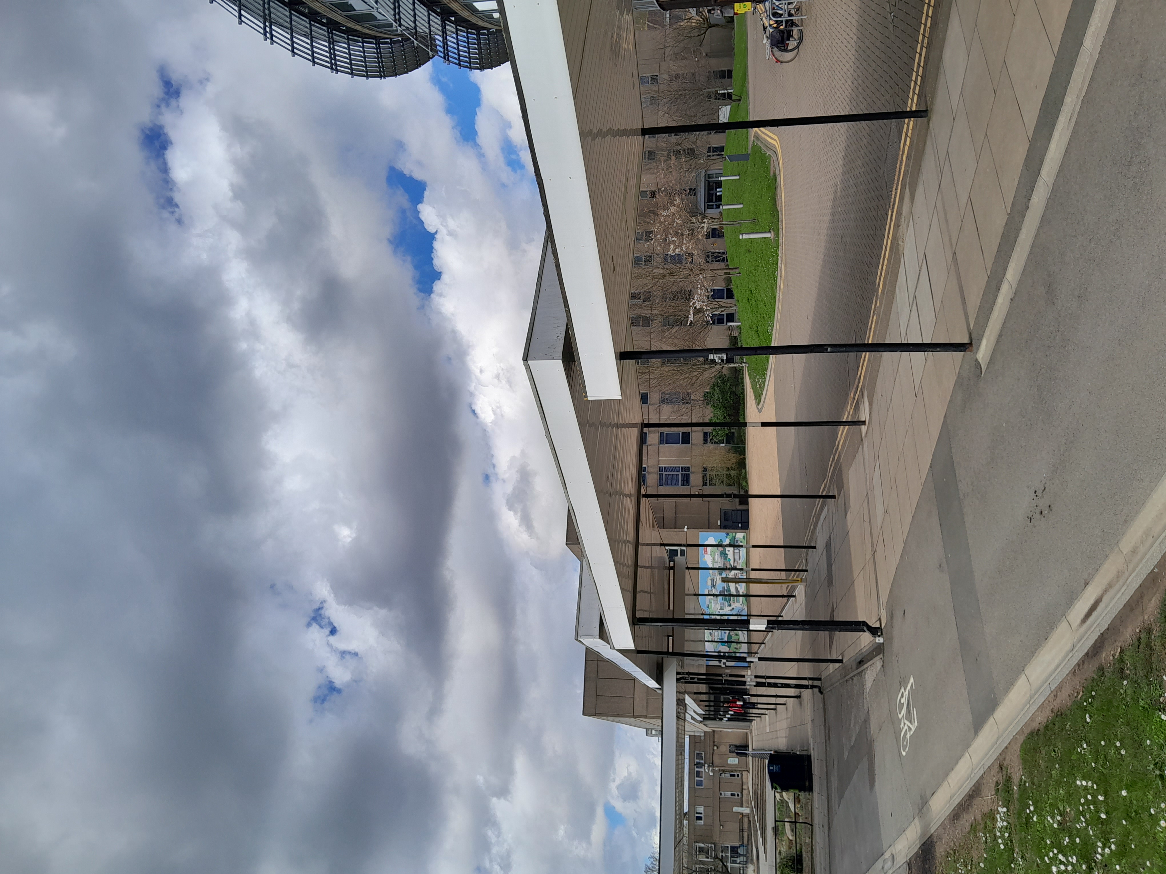 A photo of the covered walkway, University of York, showing the section that curves towards Vanbrugh College