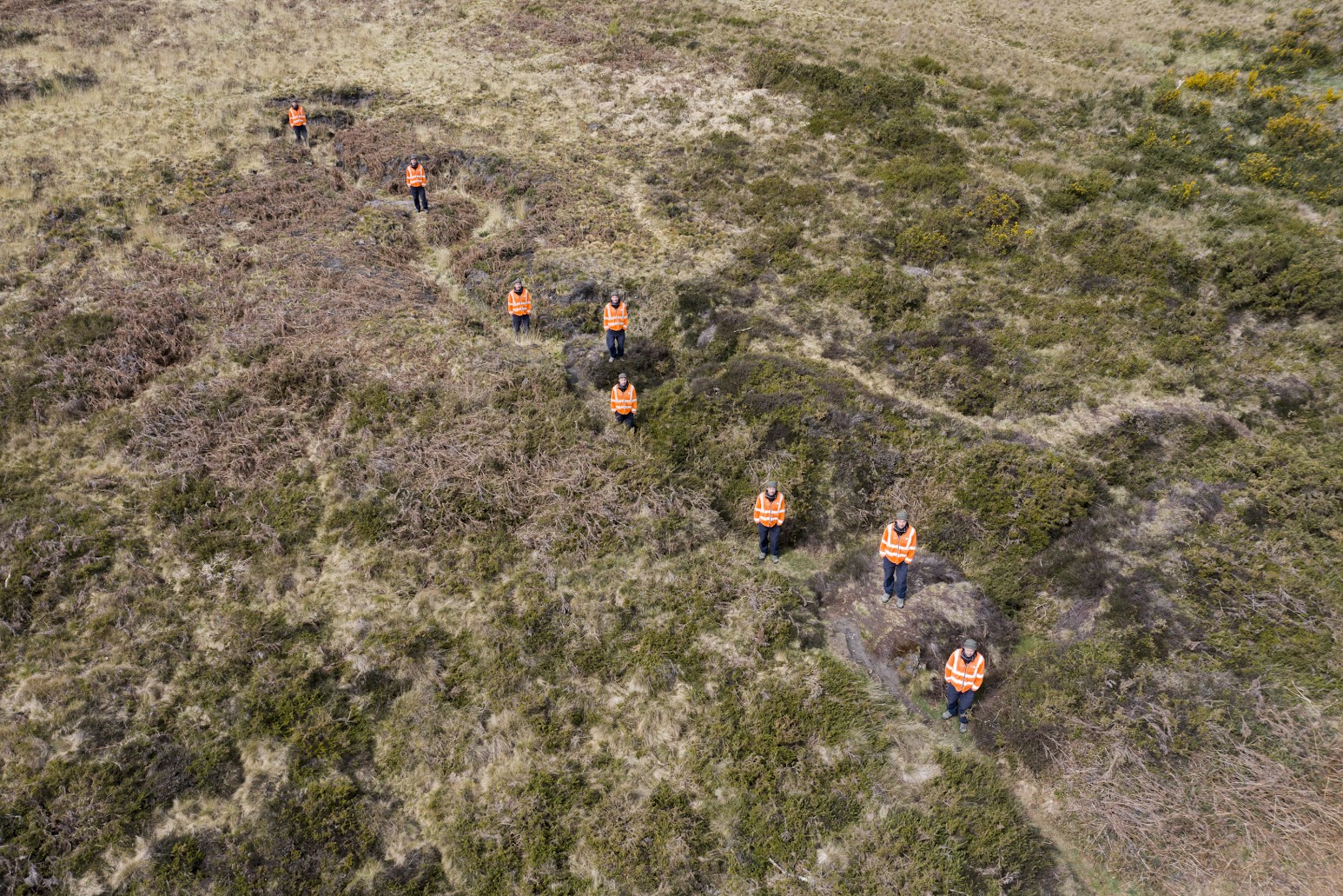 Archaeological Investigator showing the practice trench 