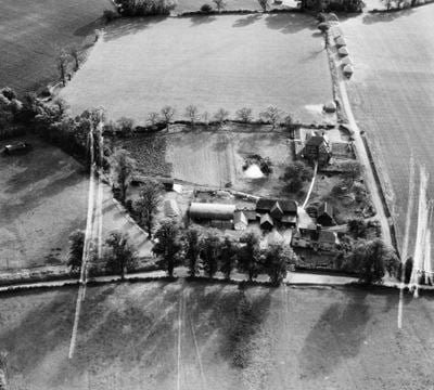 Swangles Farm, Cold Christmas, 1947. This image was marked by Aerofilms Ltd for photo editing.