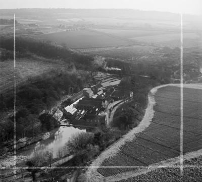 Basted Paper Mills and the surrounding countryside, Basted, from the north-west, 1948. This image was marked by Aerofilms Ltd for photo editing.