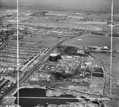 Hilsea Gas Works, Portsmouth Airport and environs, Anchorage Park, from the south, 1949. This image was marked by Aerofilms Ltd for photo editing.