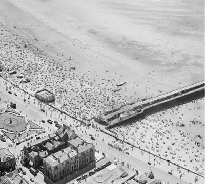 Crowds on the beach near the entrance to the Grand Pier, Weston-super-Mare, 1949