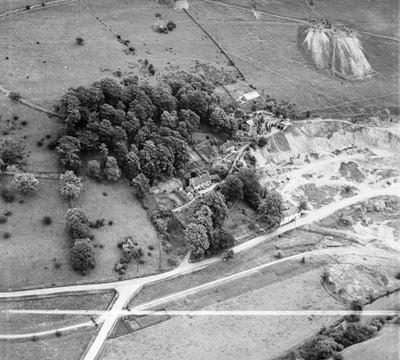 The Hillocks (The Castle) and the hamlet, Ecton, 1950. This image was marked by Aerofilms Ltd for photo editing.